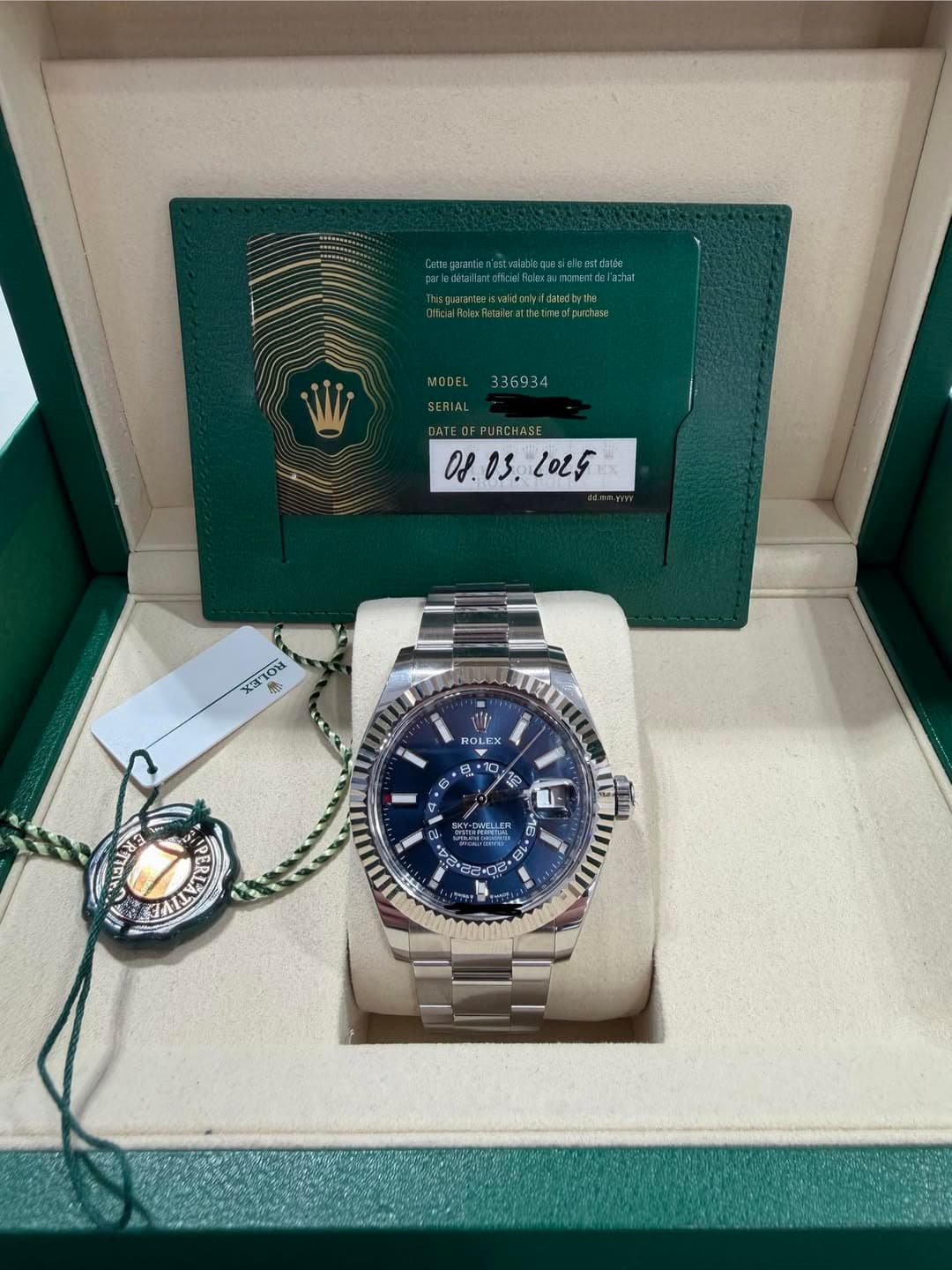 May be an image of wrist watch and text