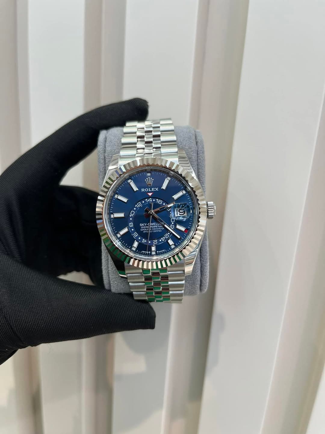 May be an image of wrist watch and text
