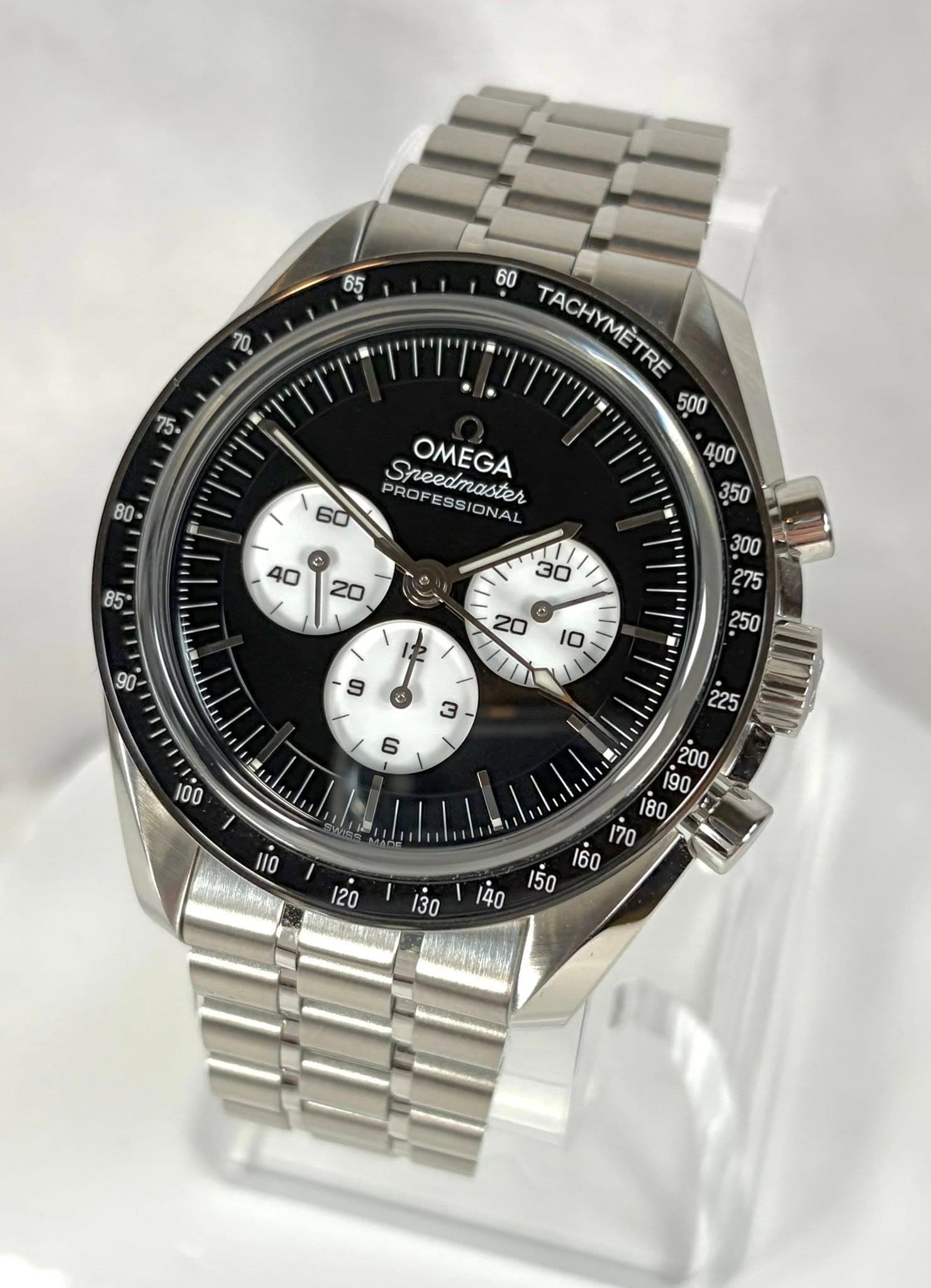 May be an image of wrist watch and text that says ' TACHYMÈTRE TACHYMETRE PROFESSIONA PROF Sreedmaster OMEGA ONAI บุพคา 250 3 6ေ ppAa KЛKoc'