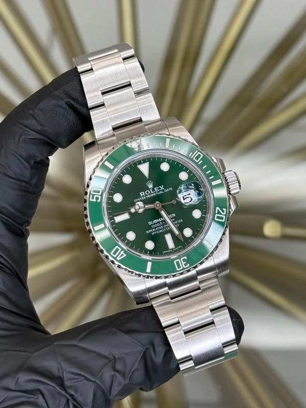 May be an image of wrist watch and text that says '10 50 RO ROLE EX ALD X DATE C PERPETUAL LE 5 ER SUBMAI EK eo HETTR 1000/ SUPERLATIE YOo0/ 20 40 30'