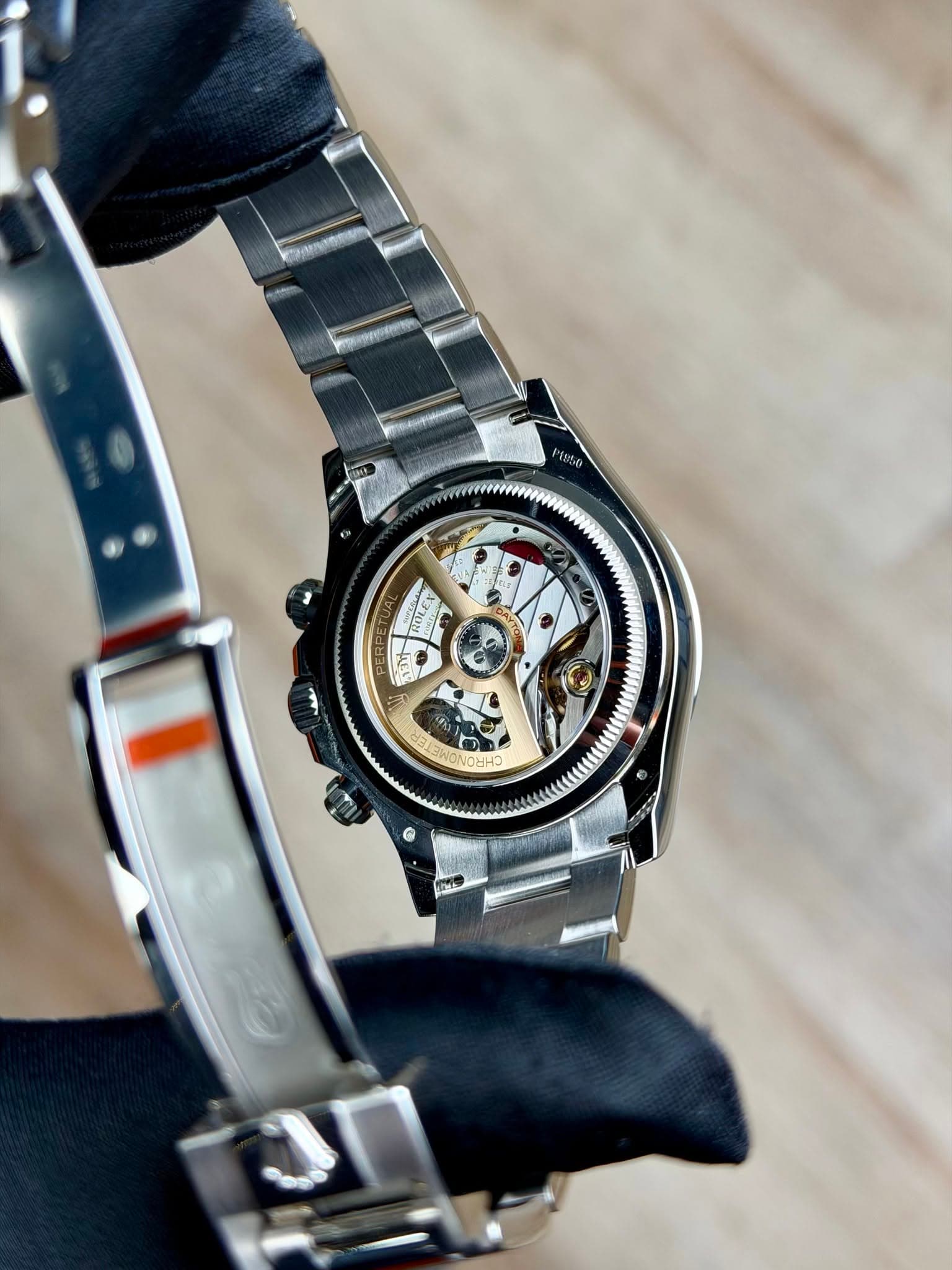 May be an image of wrist watch and text