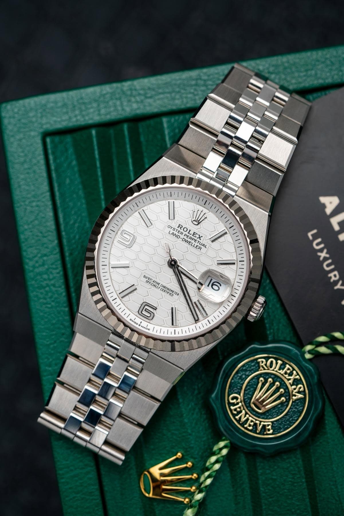 May be an image of wrist watch and text