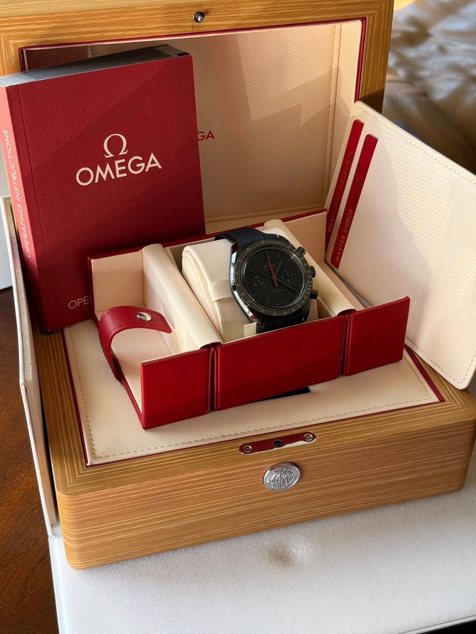 May be an image of wrist watch and text that says 'ח OMEGA'