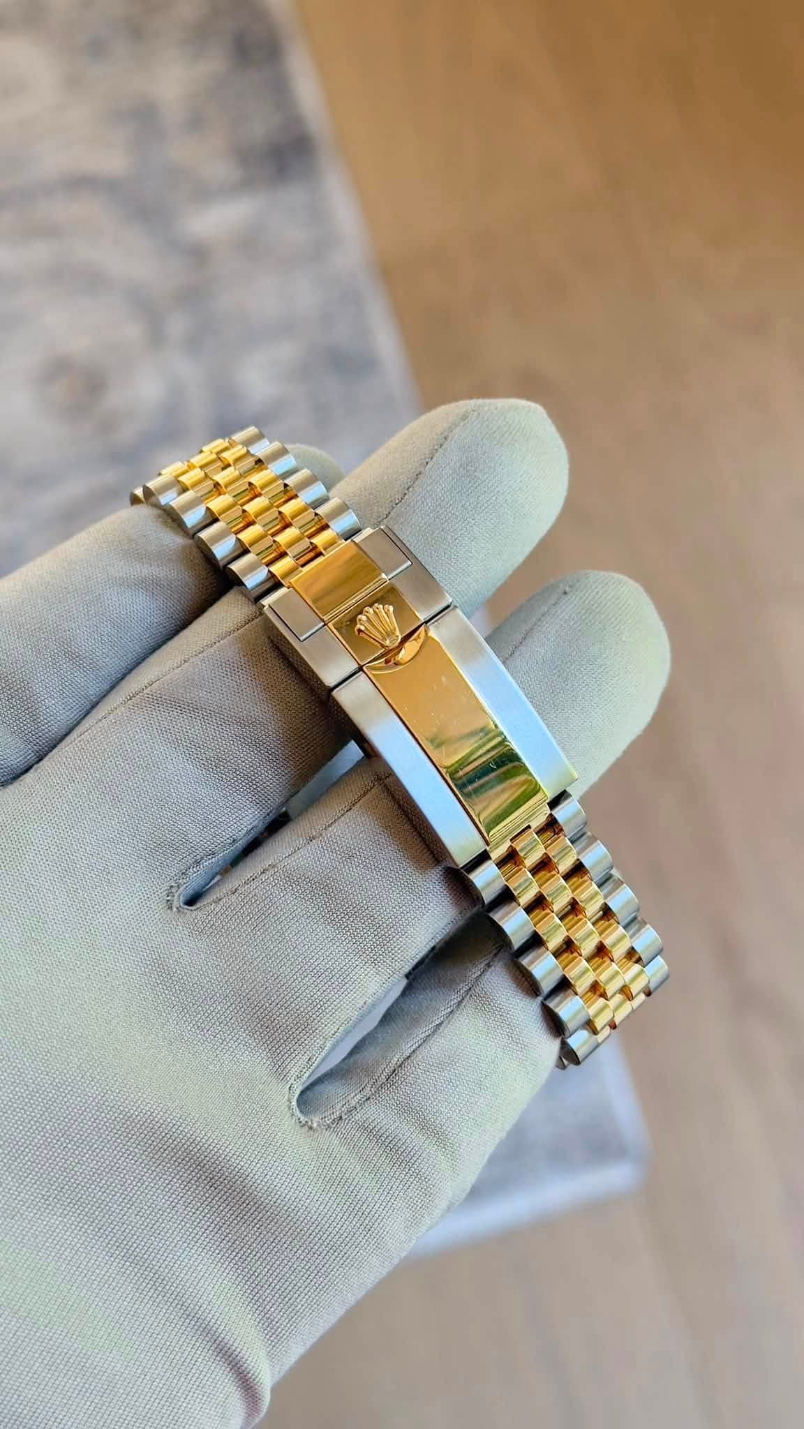 May be an image of wrist watch