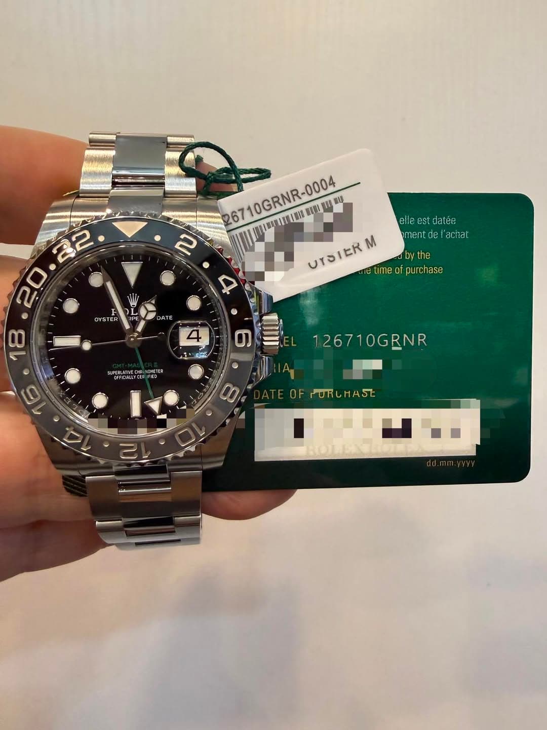 May be an image of wrist watch and text that says '2 ع aile est datée mentdel'achat l'achat 22 20 18 /国如 26710GRNR-0004 ห UYSIERI timeofpurchase time M bythe ourchase OYSTER ATE…