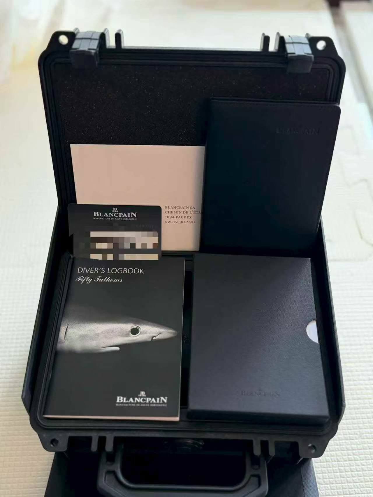 May be an image of text that says 'BLANCPAIN BLANCRAIN CHEMINDE 5094PAUDE SWITZEKLAND م DIVER'SLOGBOOK DIVER SLOGBOOK Fifly.Fathems Kifly Fathioms 風 BLANCPAIN BLA'
