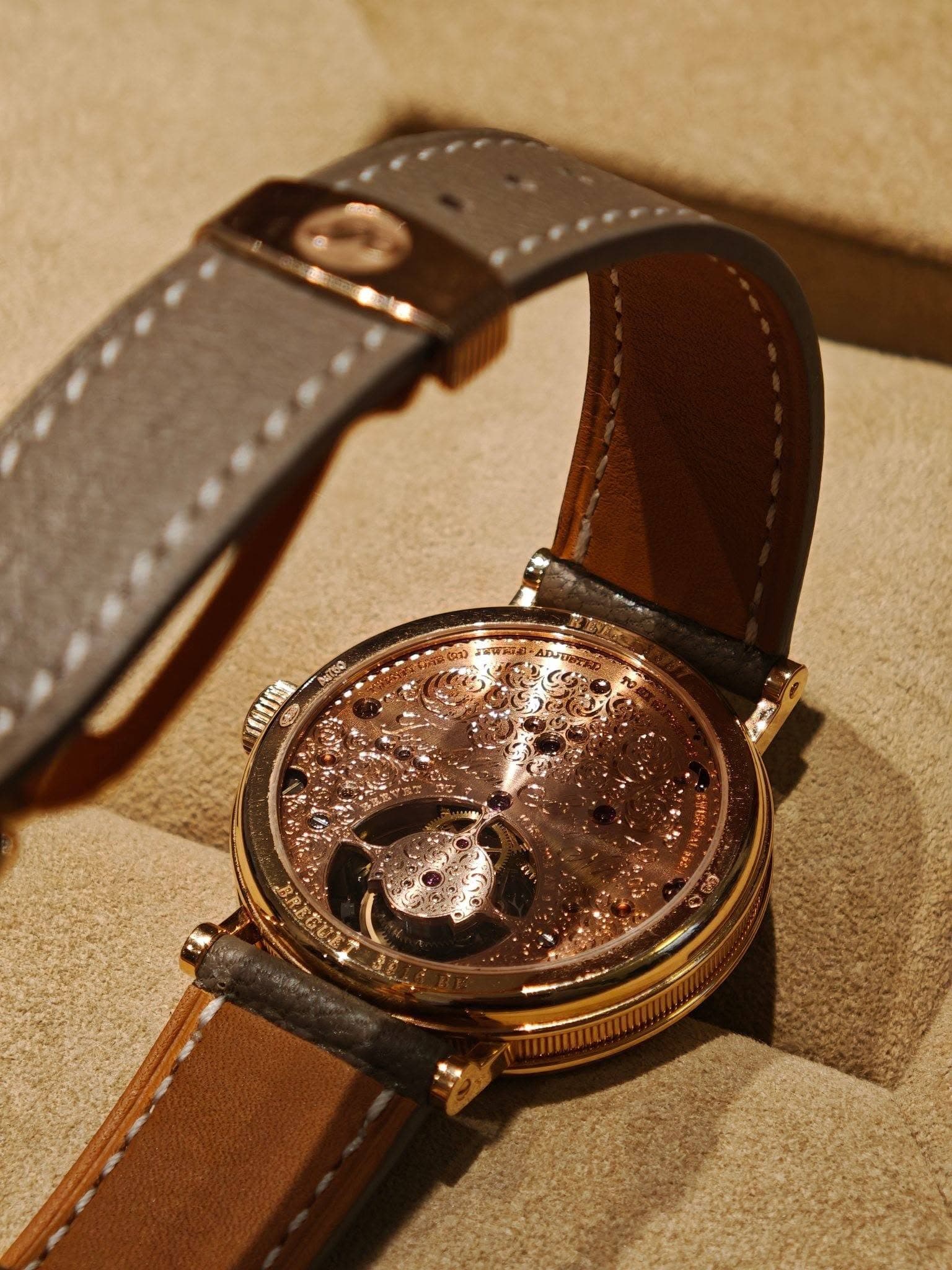 May be an image of wrist watch and text