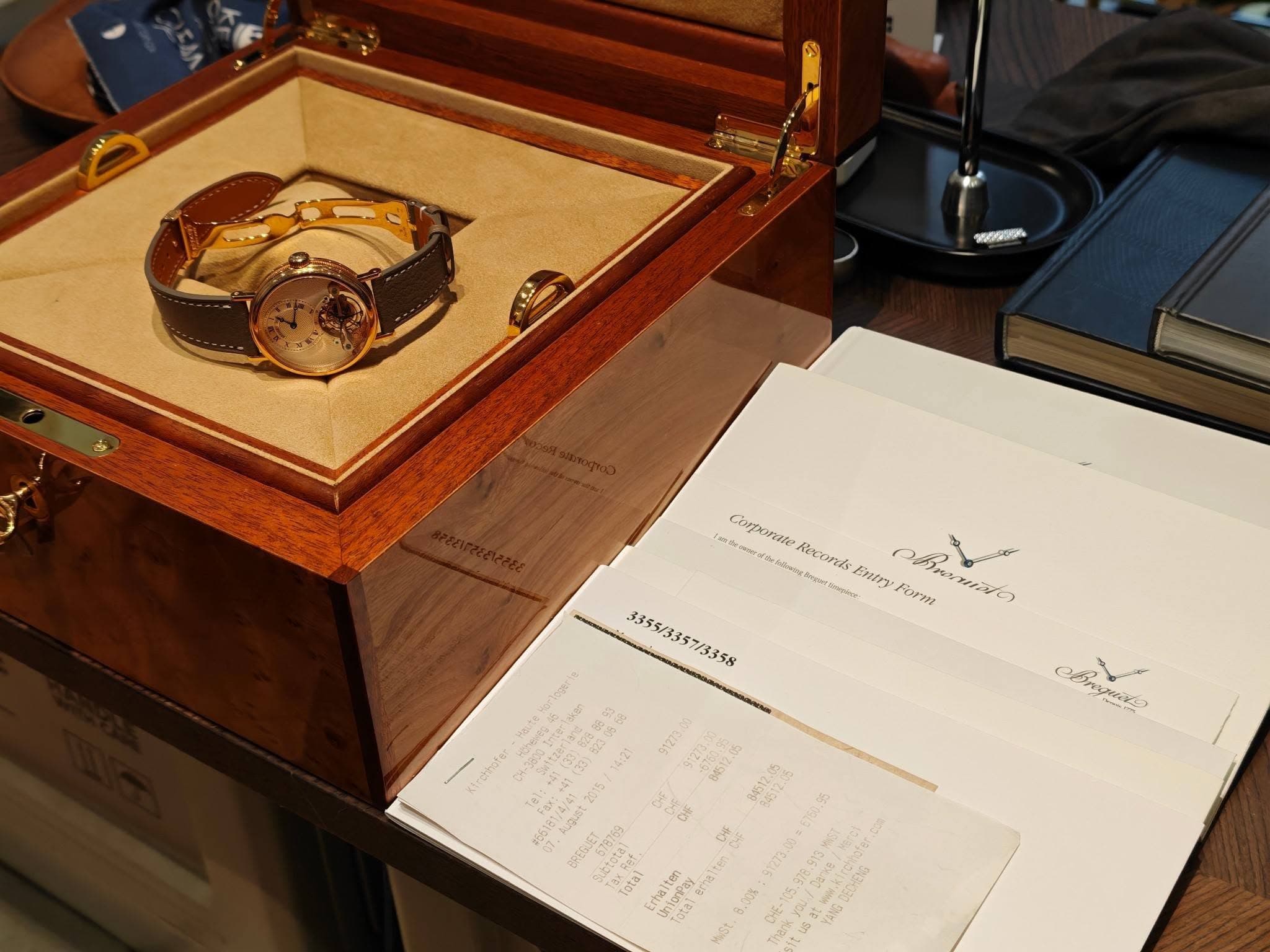 May be an image of wrist watch and text