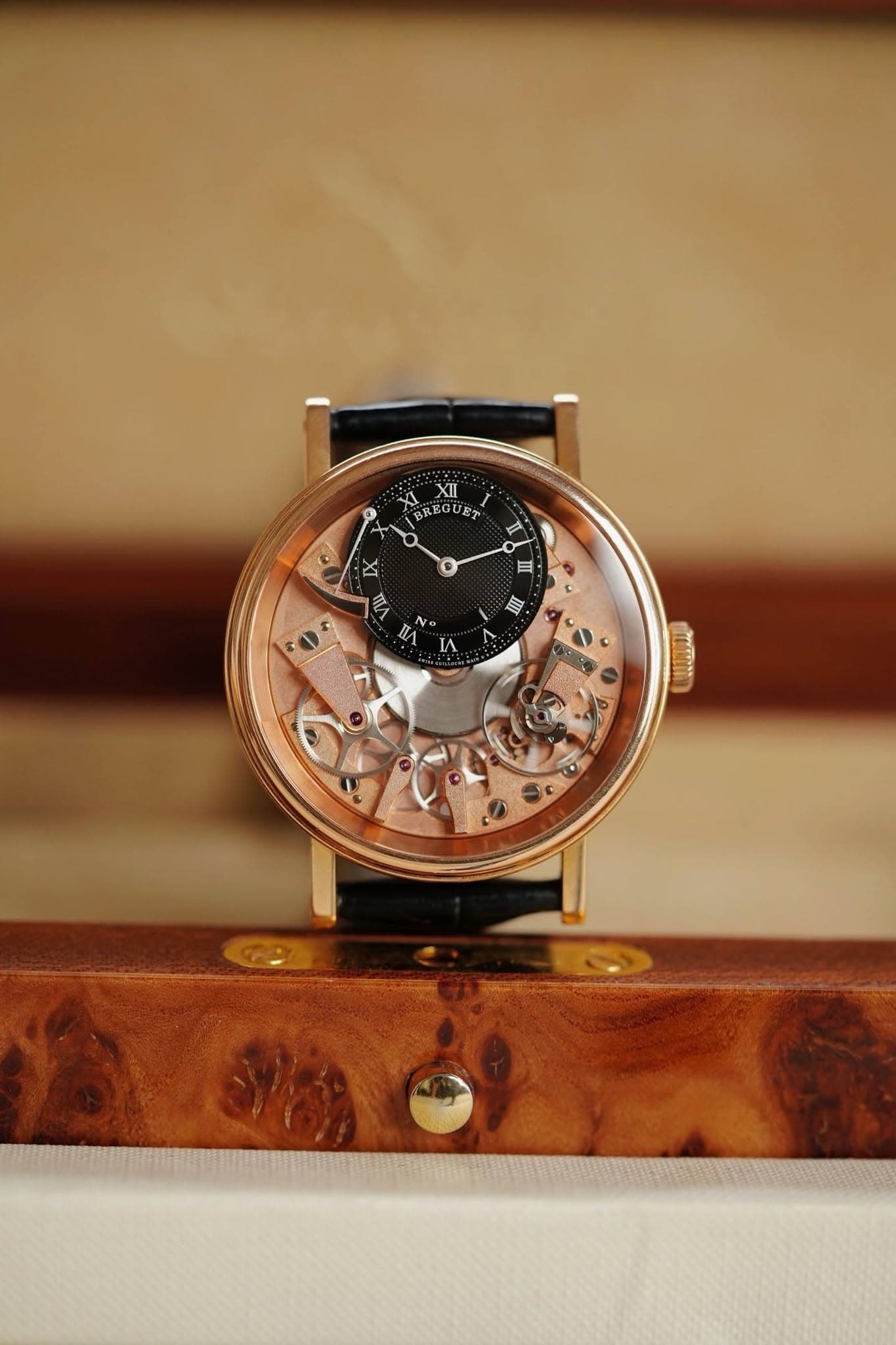 May be an image of wrist watch and text