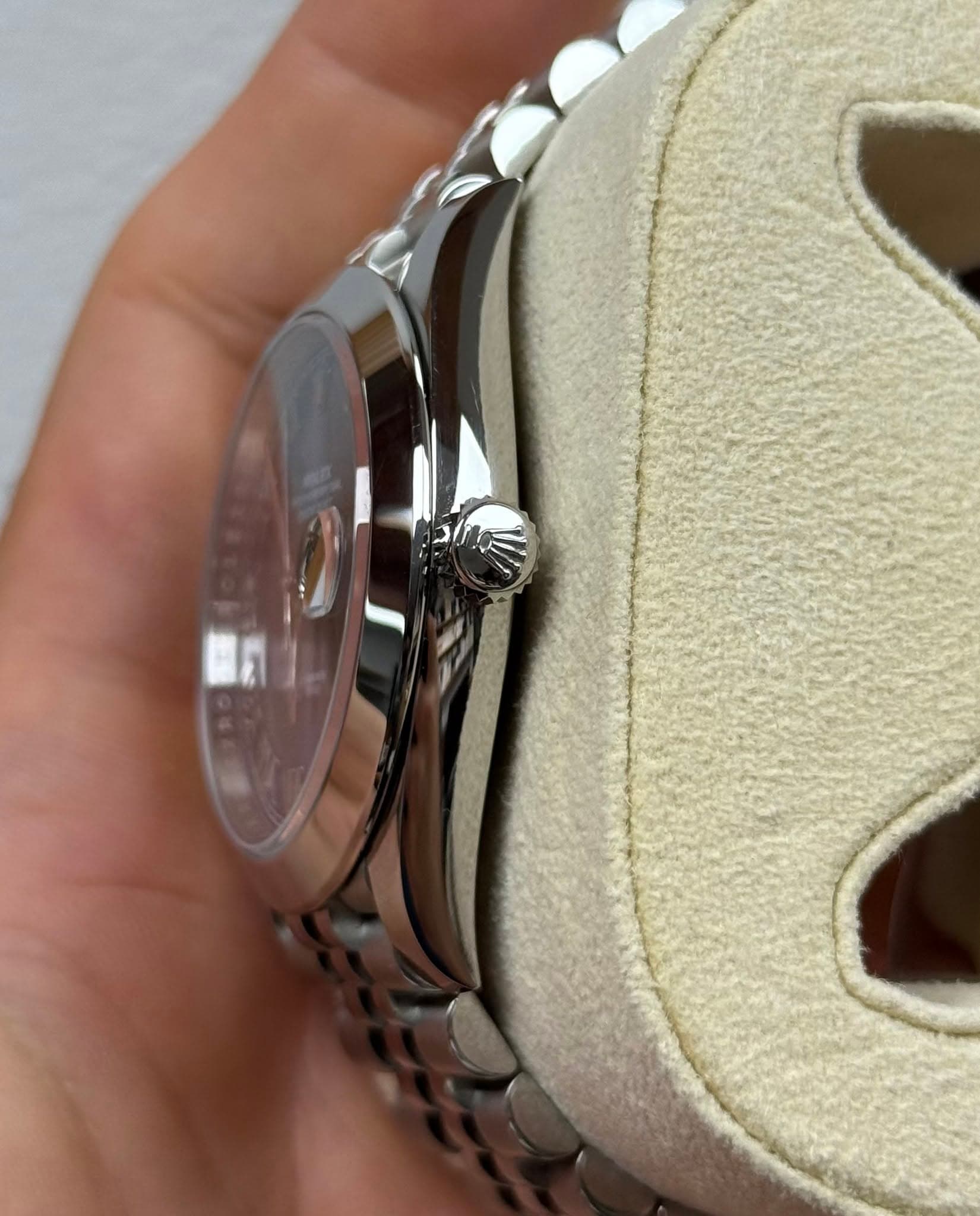 May be an image of wrist watch and text