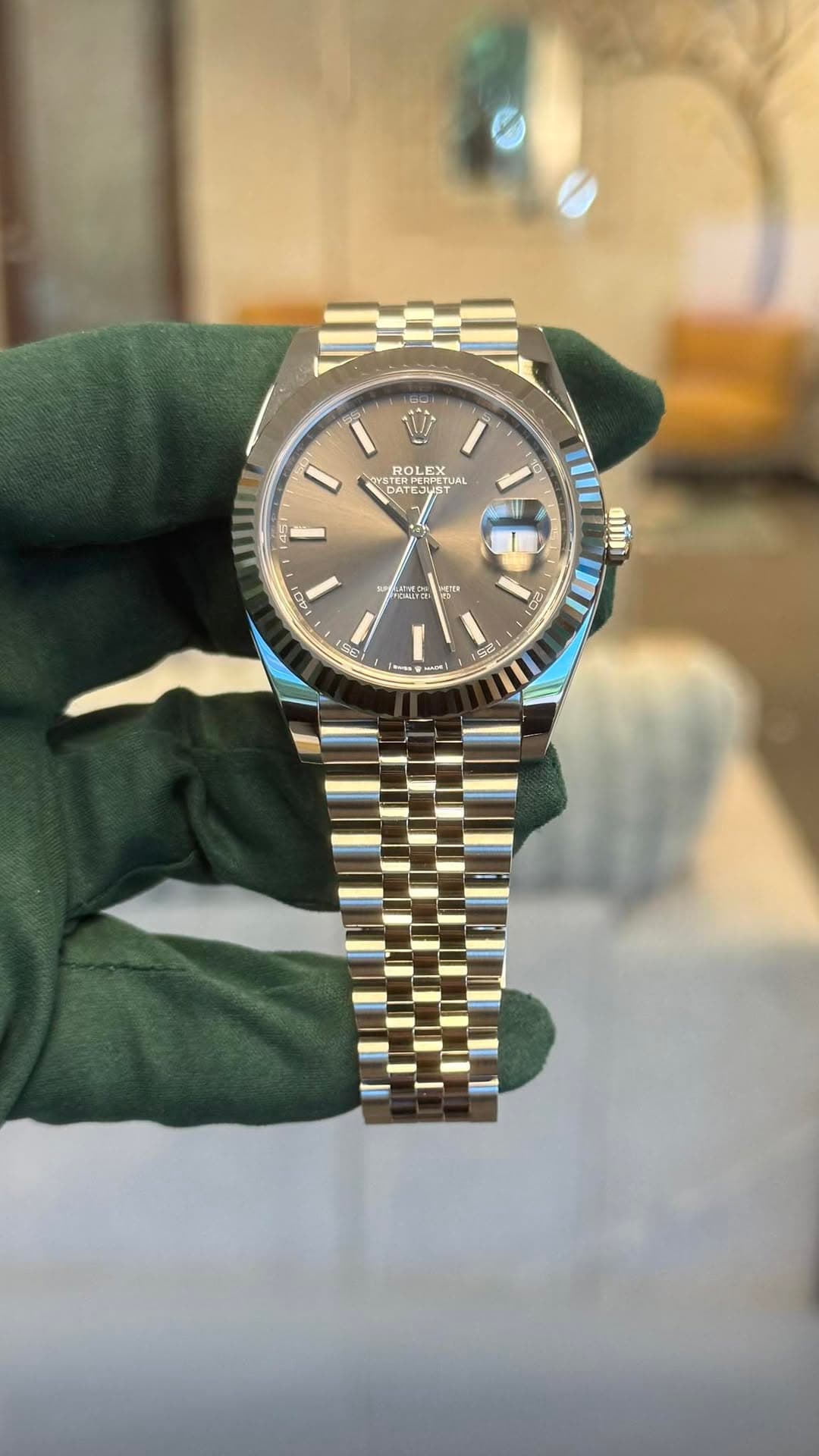 May be an image of wrist watch and text