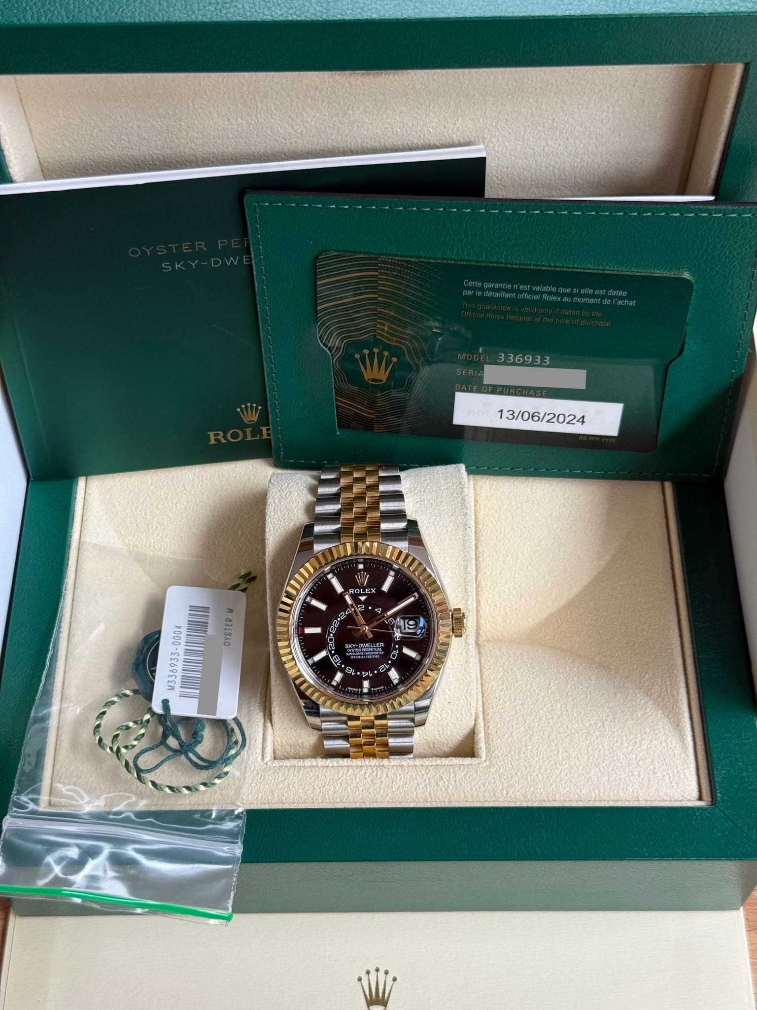 May be an image of wrist watch and text