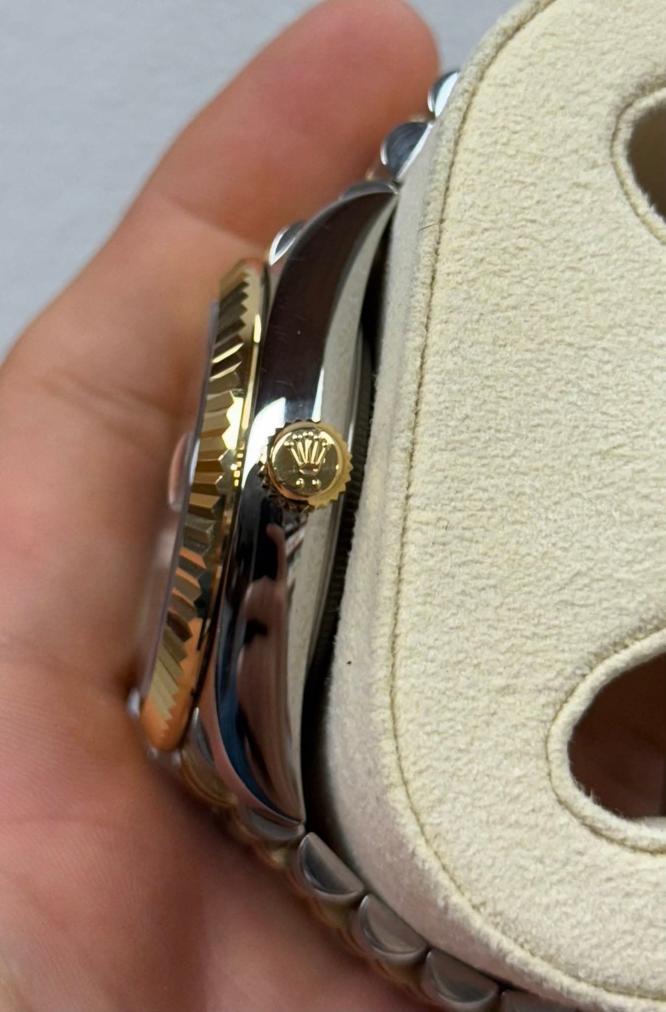 May be an image of wrist watch