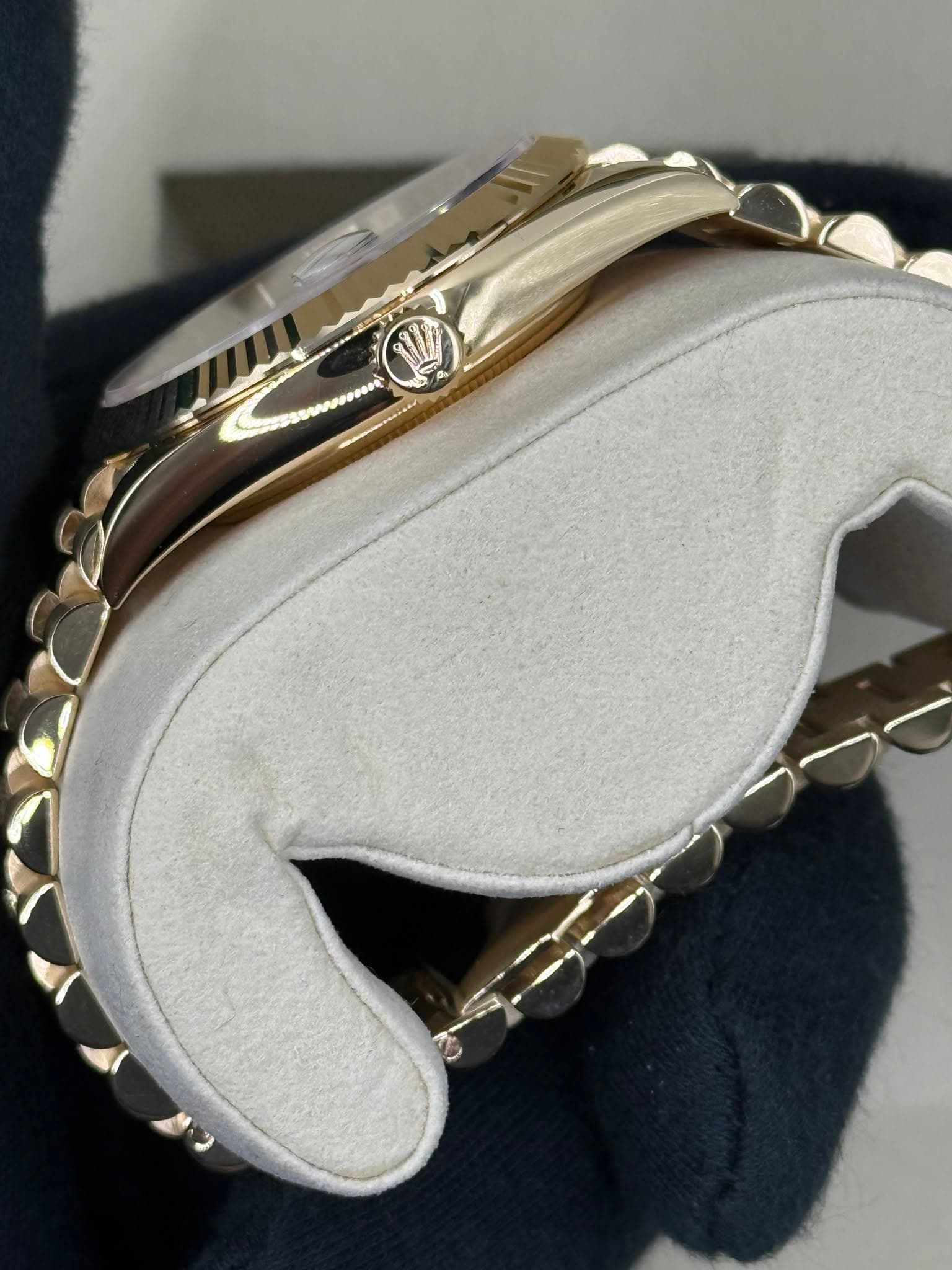 May be an image of wrist watch and text