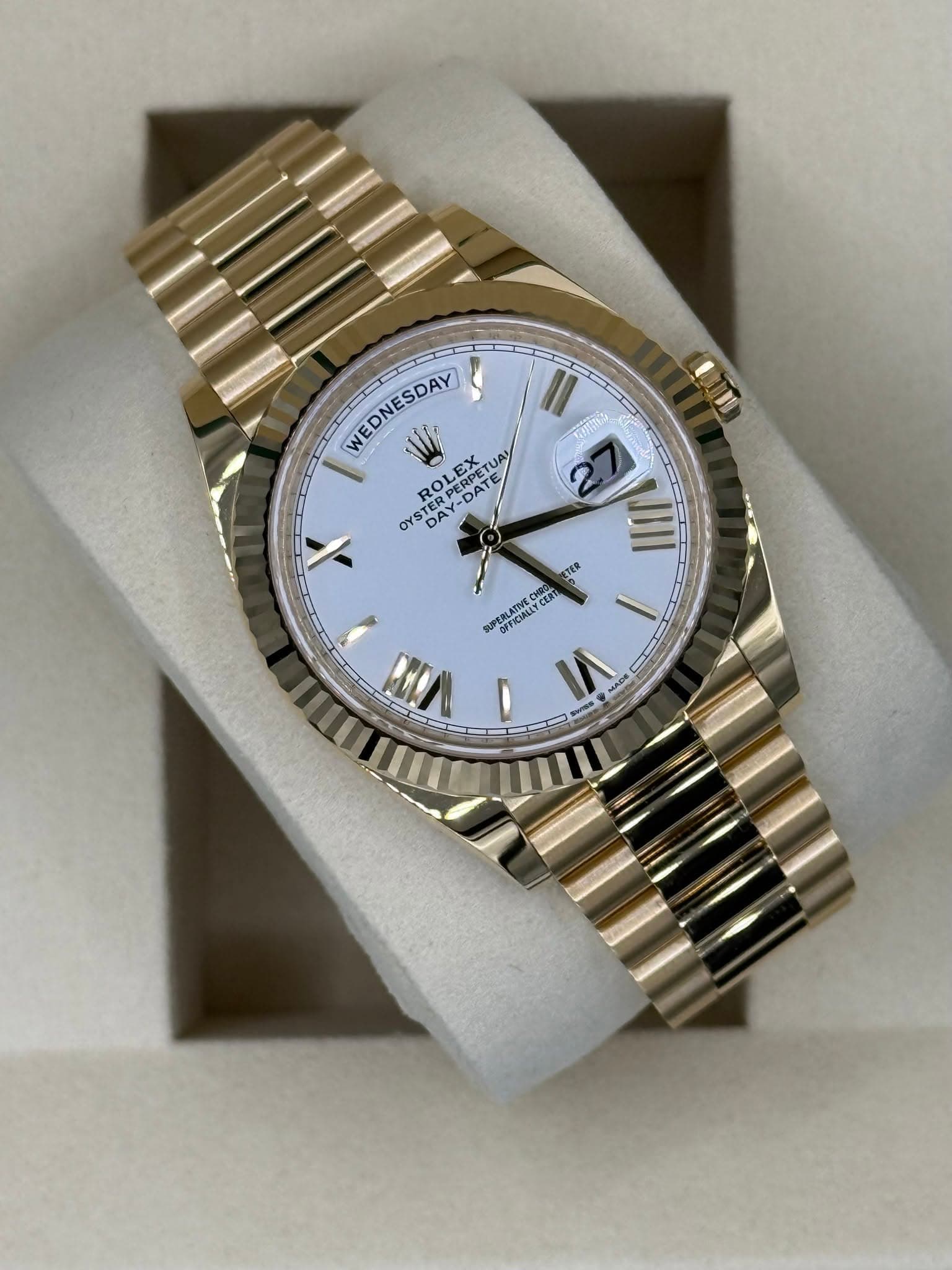 May be an image of wrist watch and text
