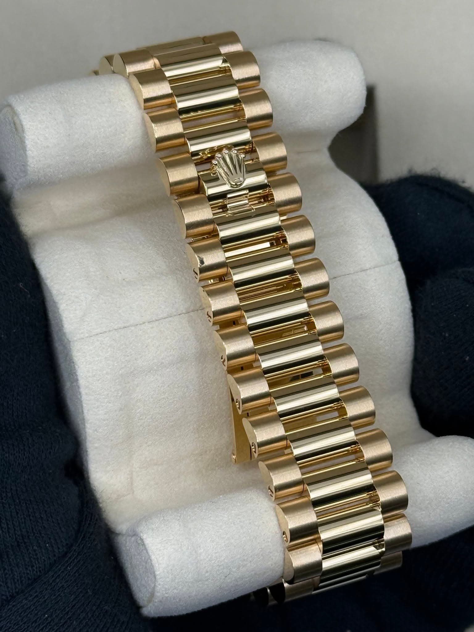 May be an image of jewelry, wrist watch and text
