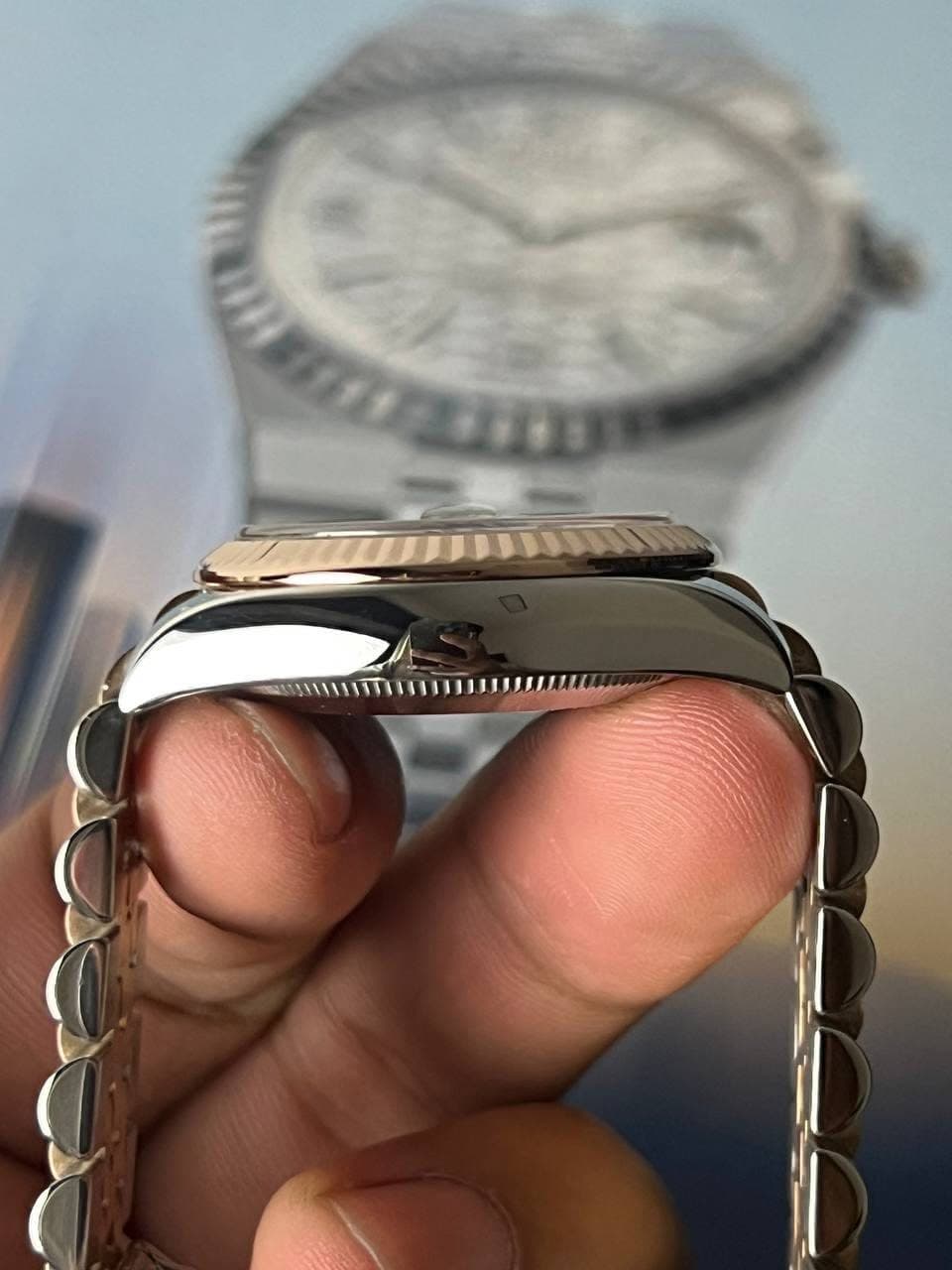 May be an image of wrist watch