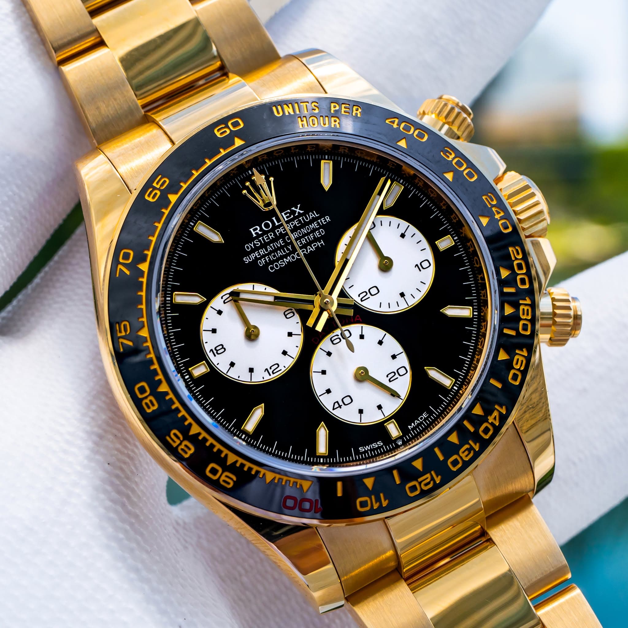 May be an image of wrist watch and text