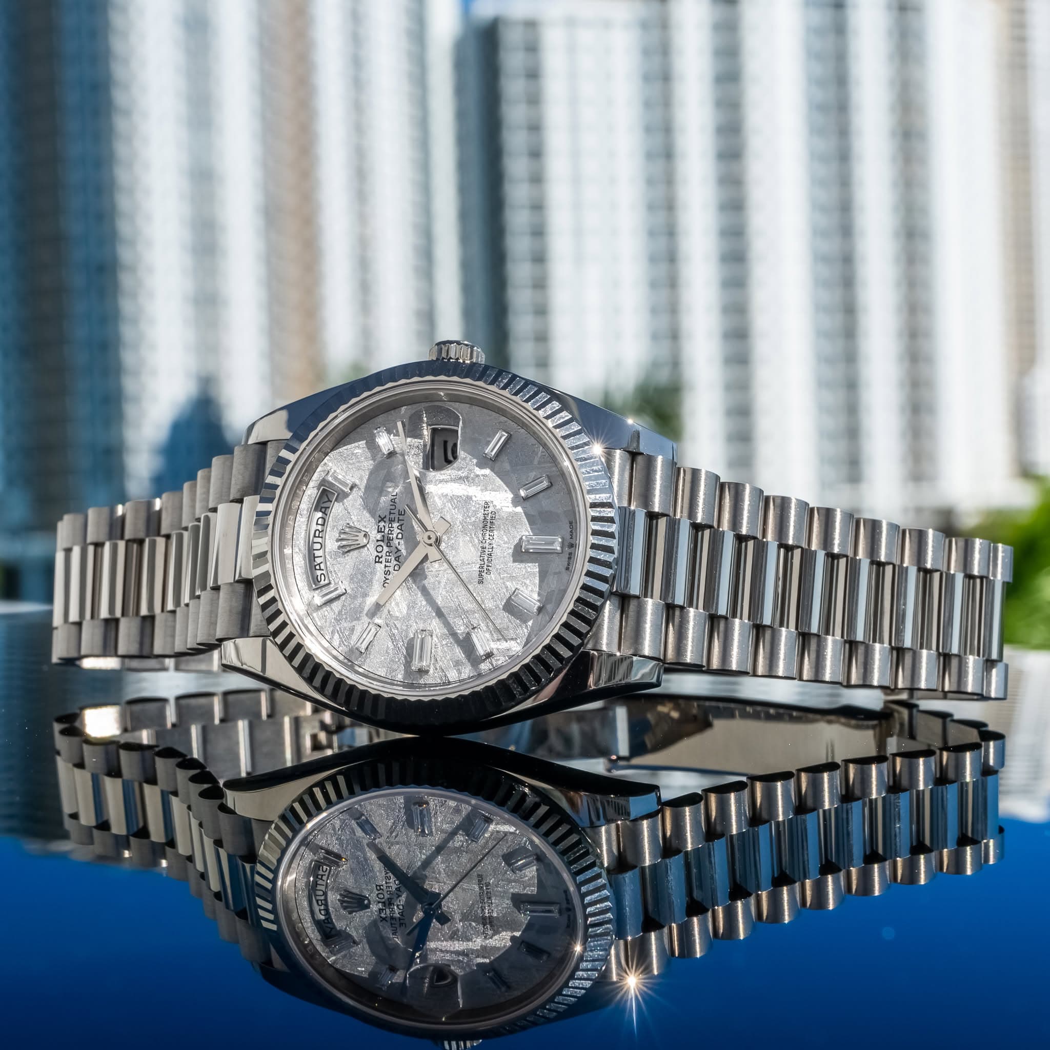 May be an image of wrist watch and text