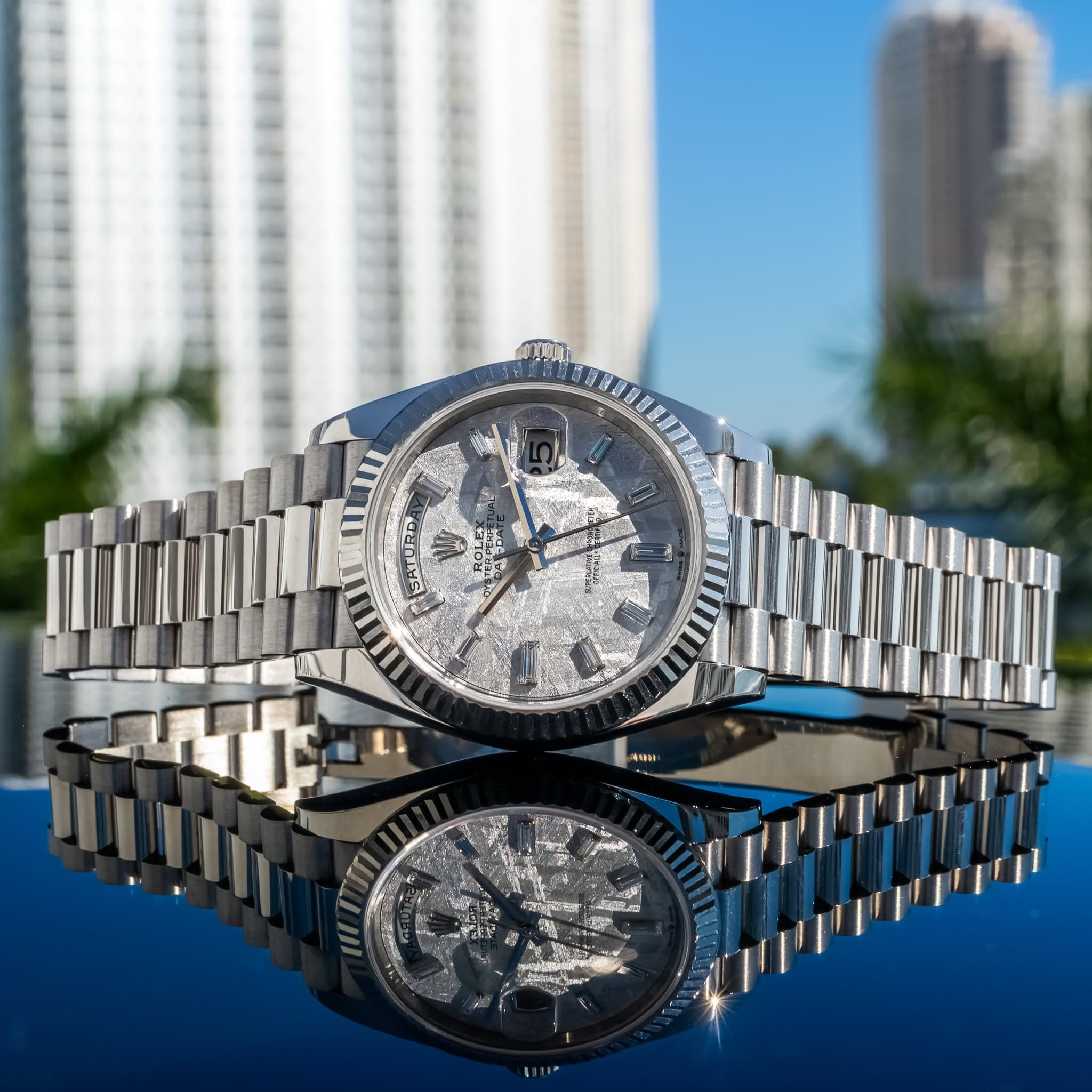 May be an image of wrist watch and text