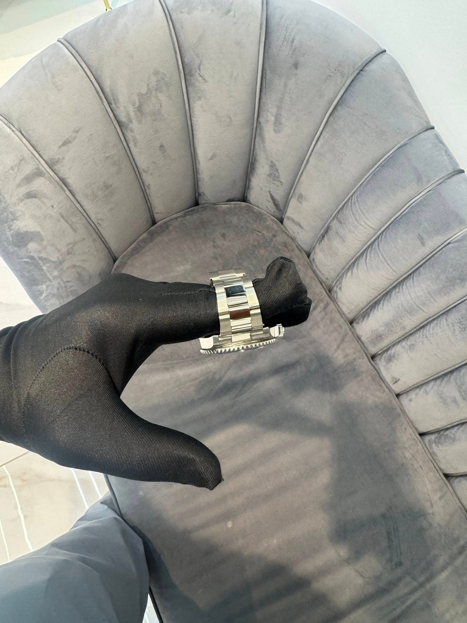 May be an image of cufflinks and wrist watch