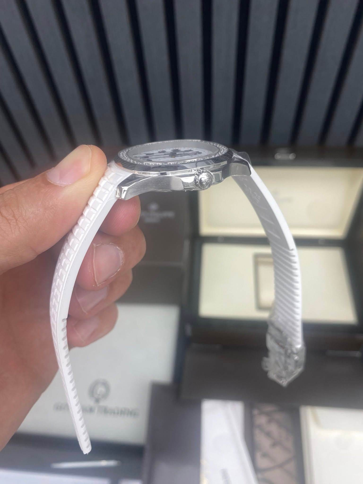 May be an image of wrist watch and text
