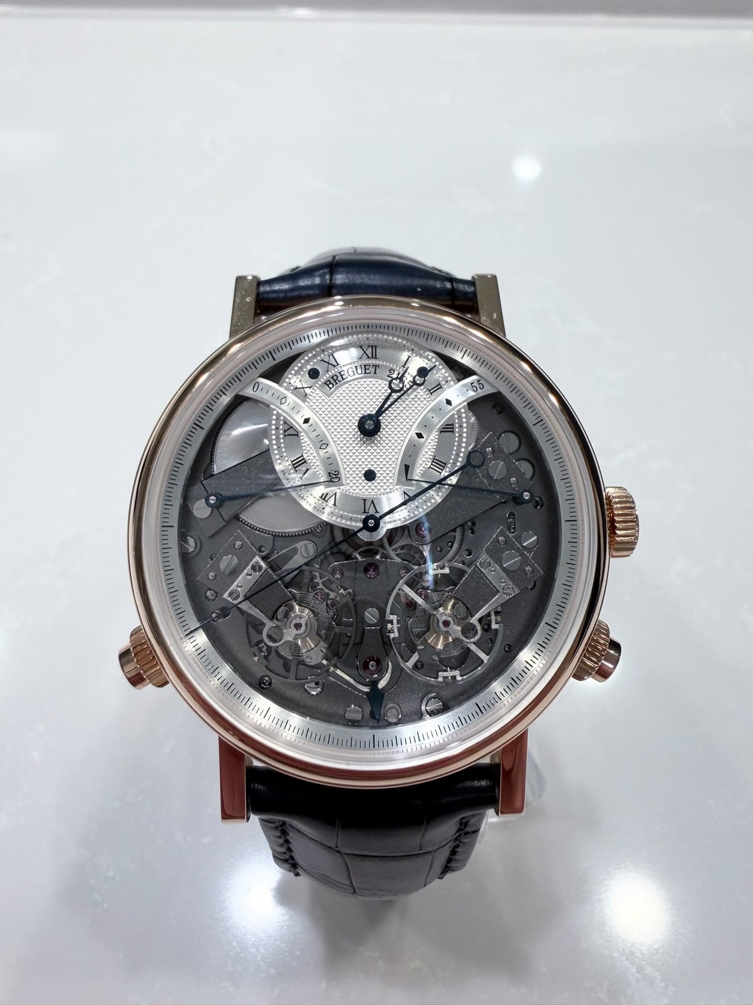 May be an image of wrist watch and text that says ':499999! BREGUE EGUE 0 ت E la G i'