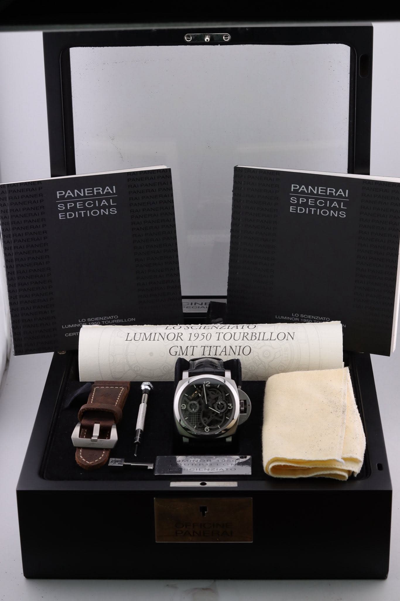 May be an image of wrist watch and text that says 'PANERAI SPECIAL EDITIONS PANERAI SPECIAL EDITIONS SCMINZIATO LUMINORI950TOURBILLON ZIAIO LUMINOR 1950 TOURBILLON GMT TITANIO'