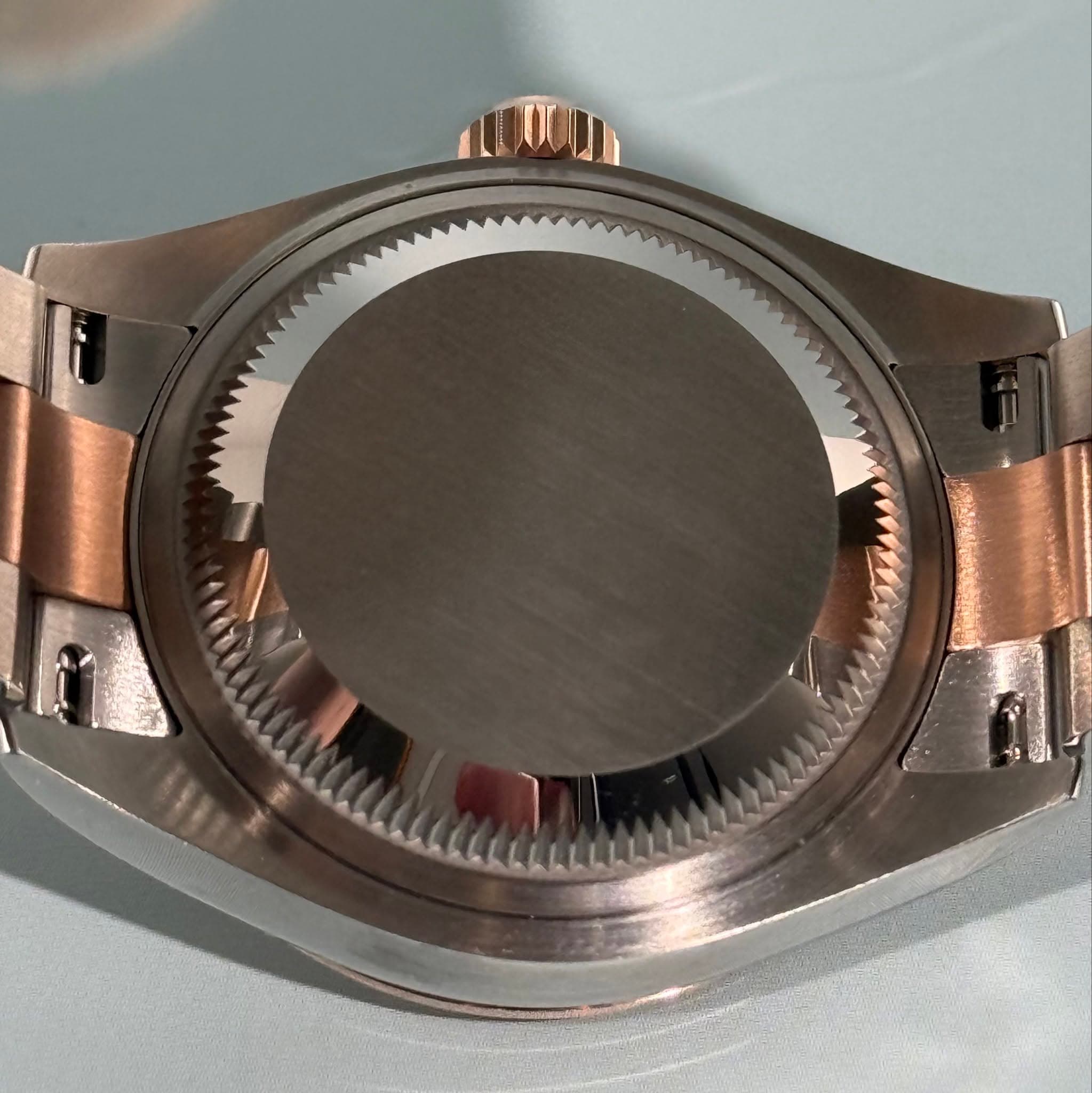 May be an image of wrist watch