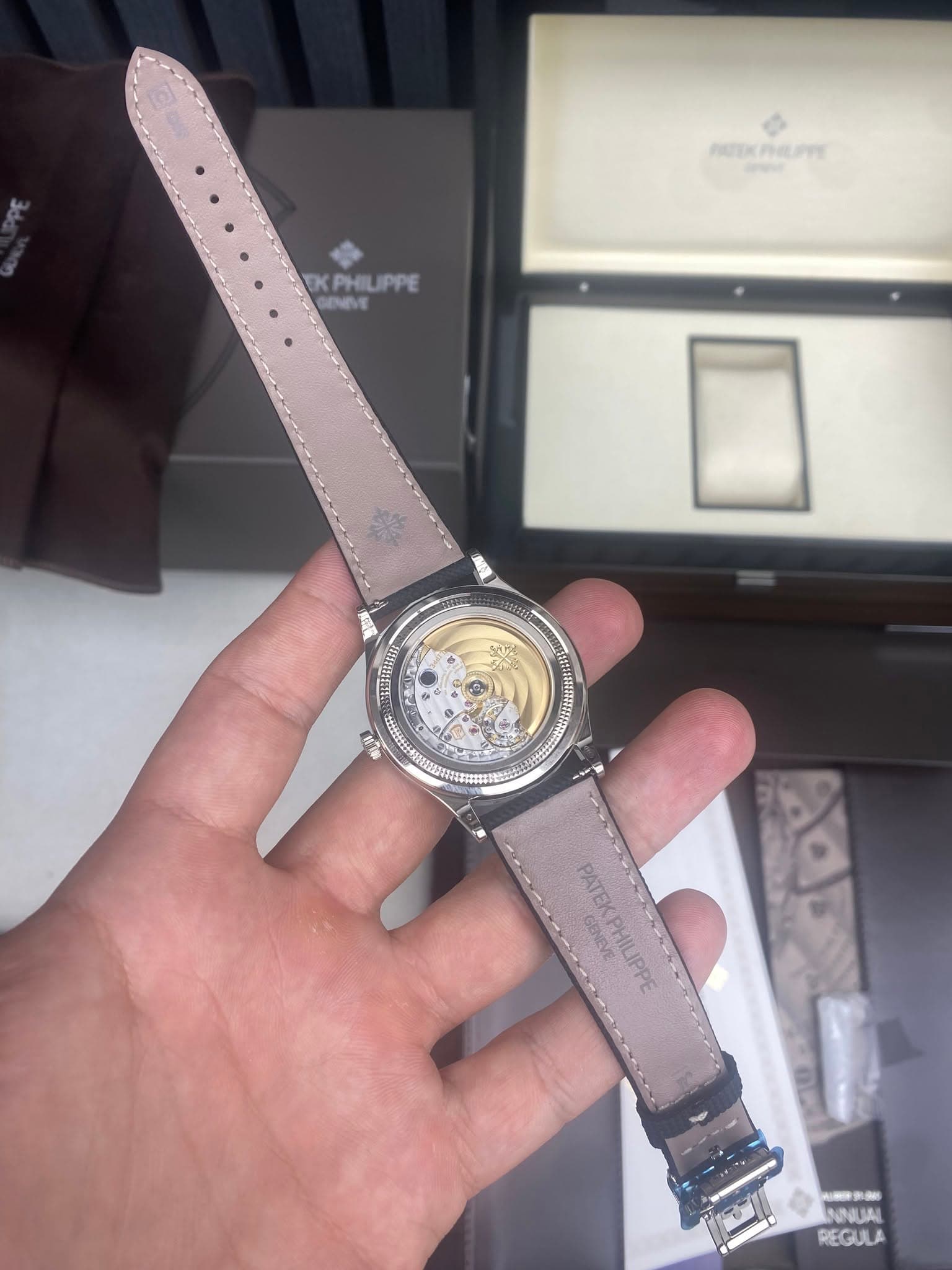 May be an image of wrist watch and text