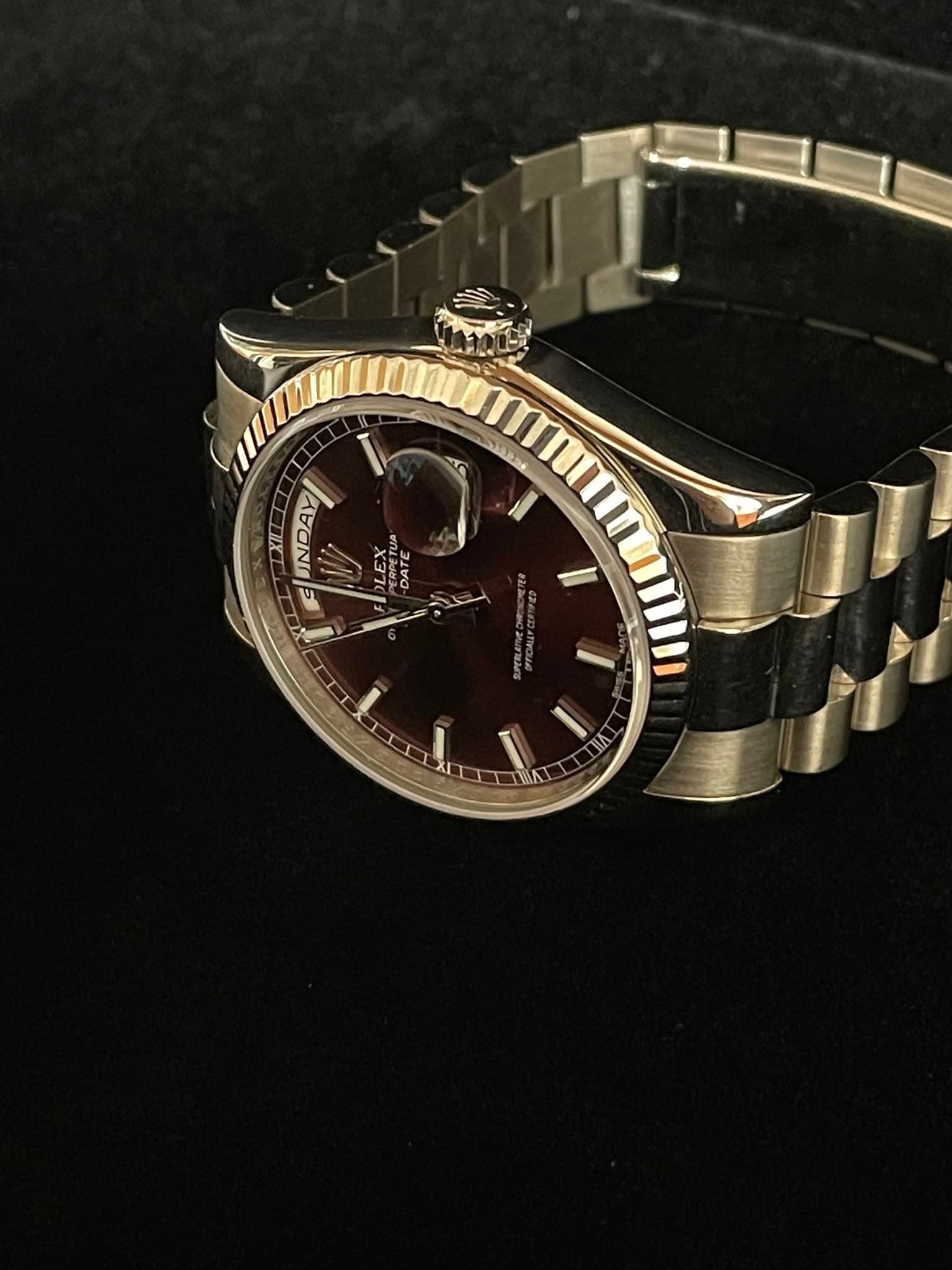 May be an image of wrist watch and text