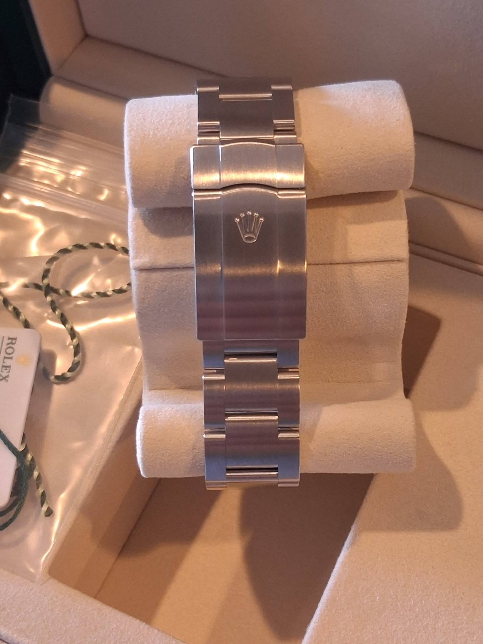 May be an image of wrist watch and text