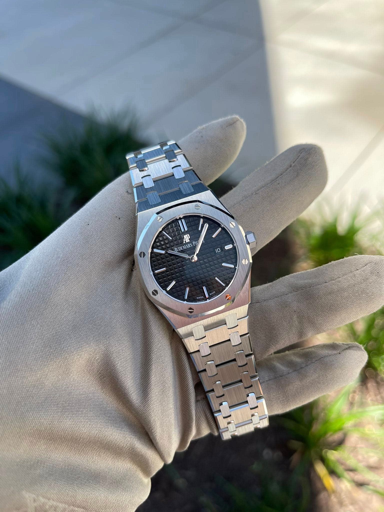 May be an image of wrist watch and text