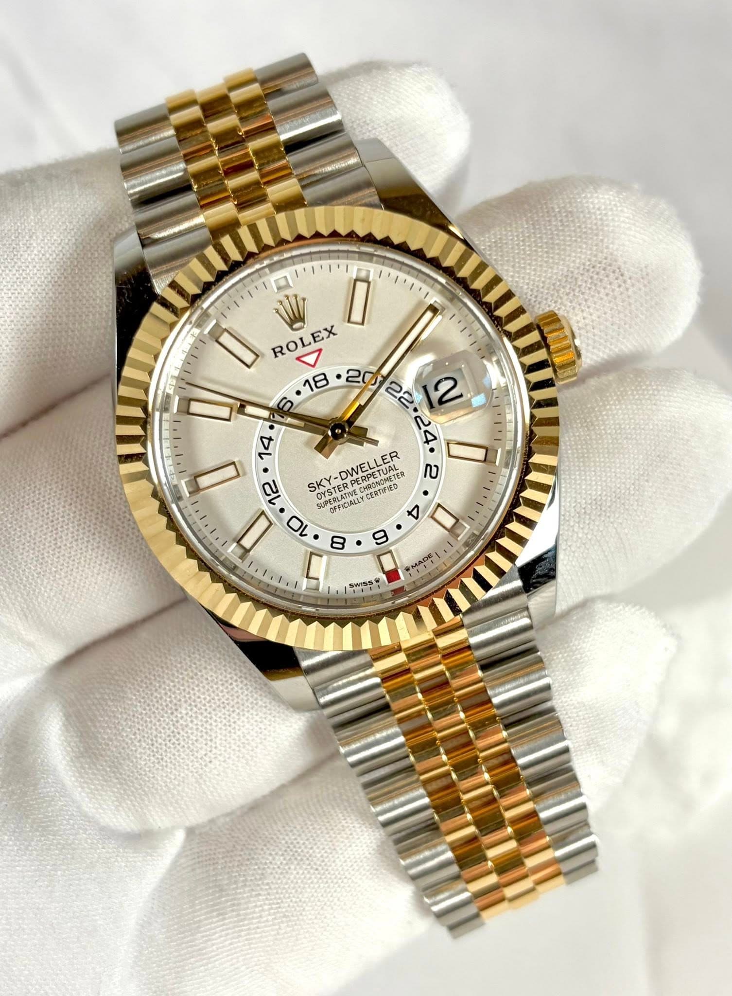 May be an image of wrist watch and text