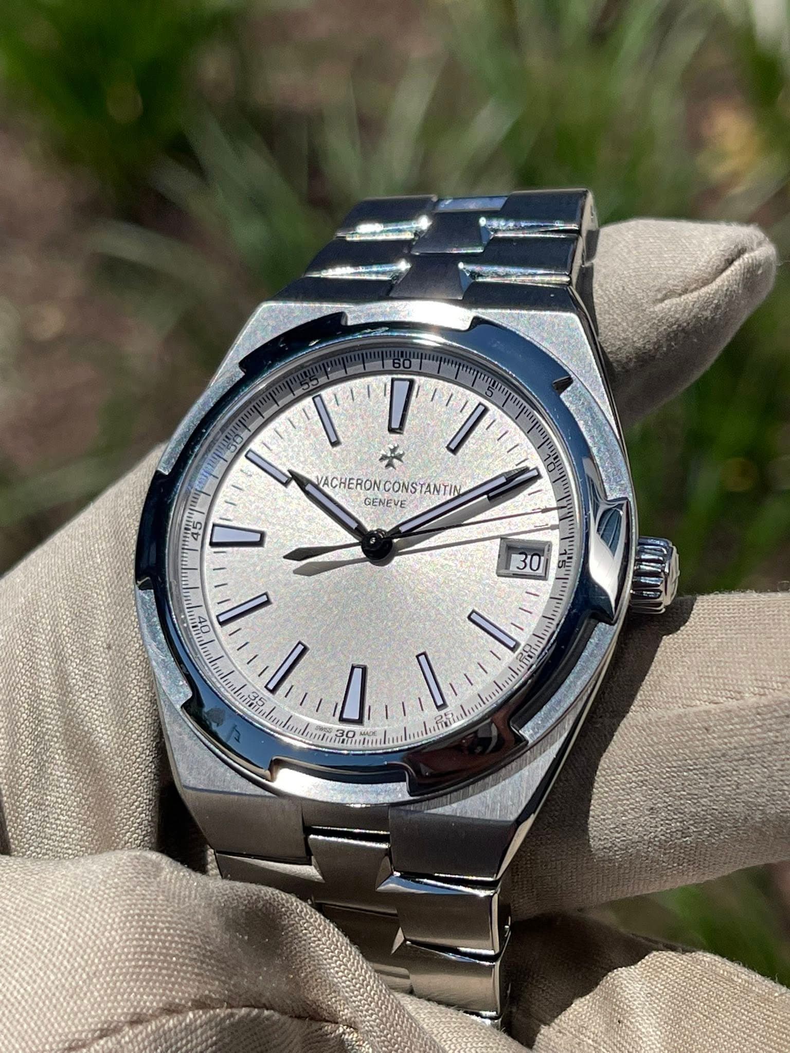 May be an image of wrist watch and text