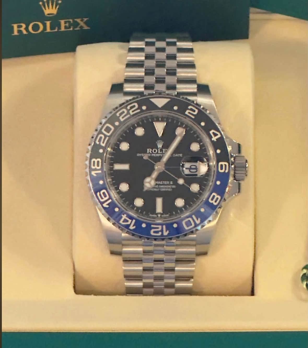May be an image of wrist watch and text that says 'ROLEX DN ROLE ATE 18 8 MASTERE '
