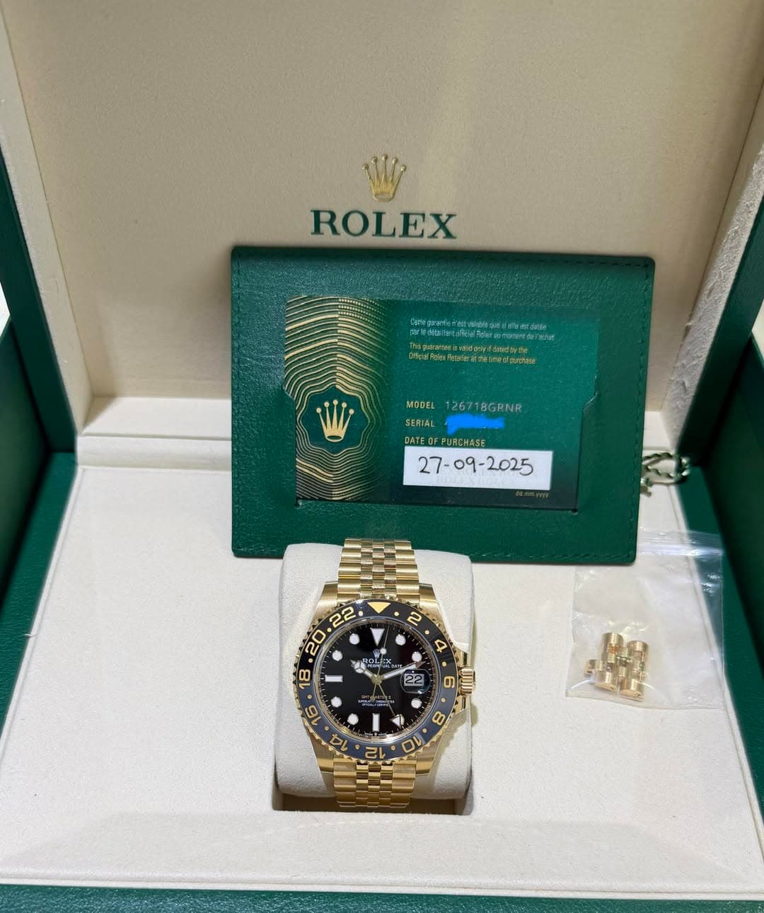 May be an image of wrist watch and text