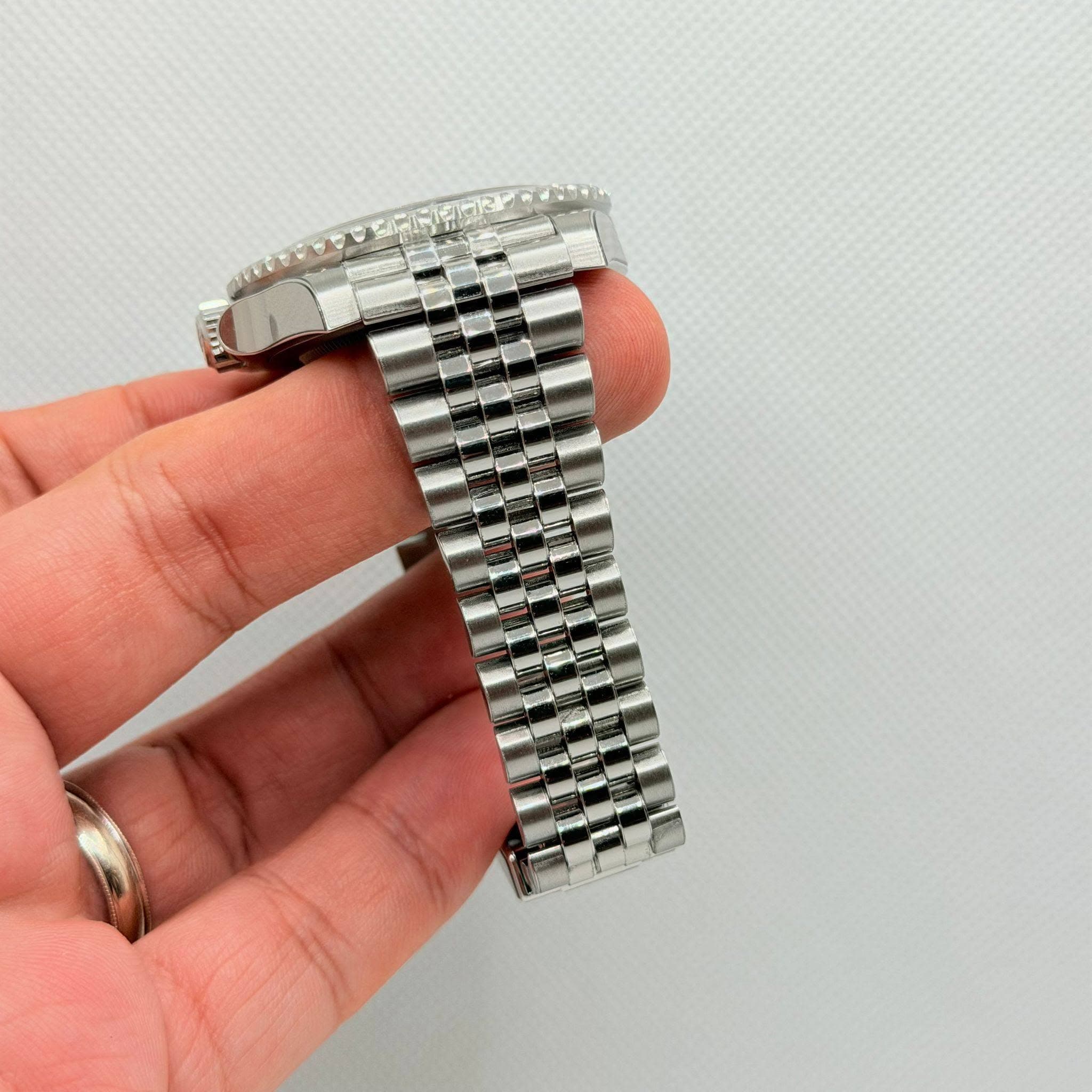 May be an image of wrist watch