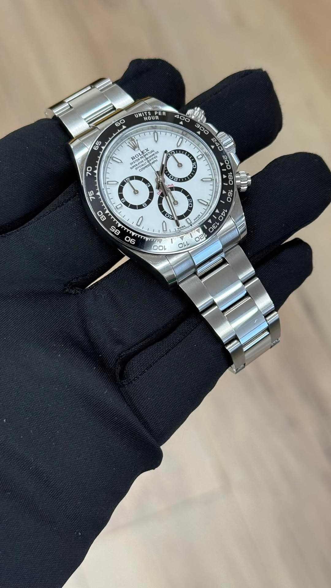 May be an image of wrist watch and text