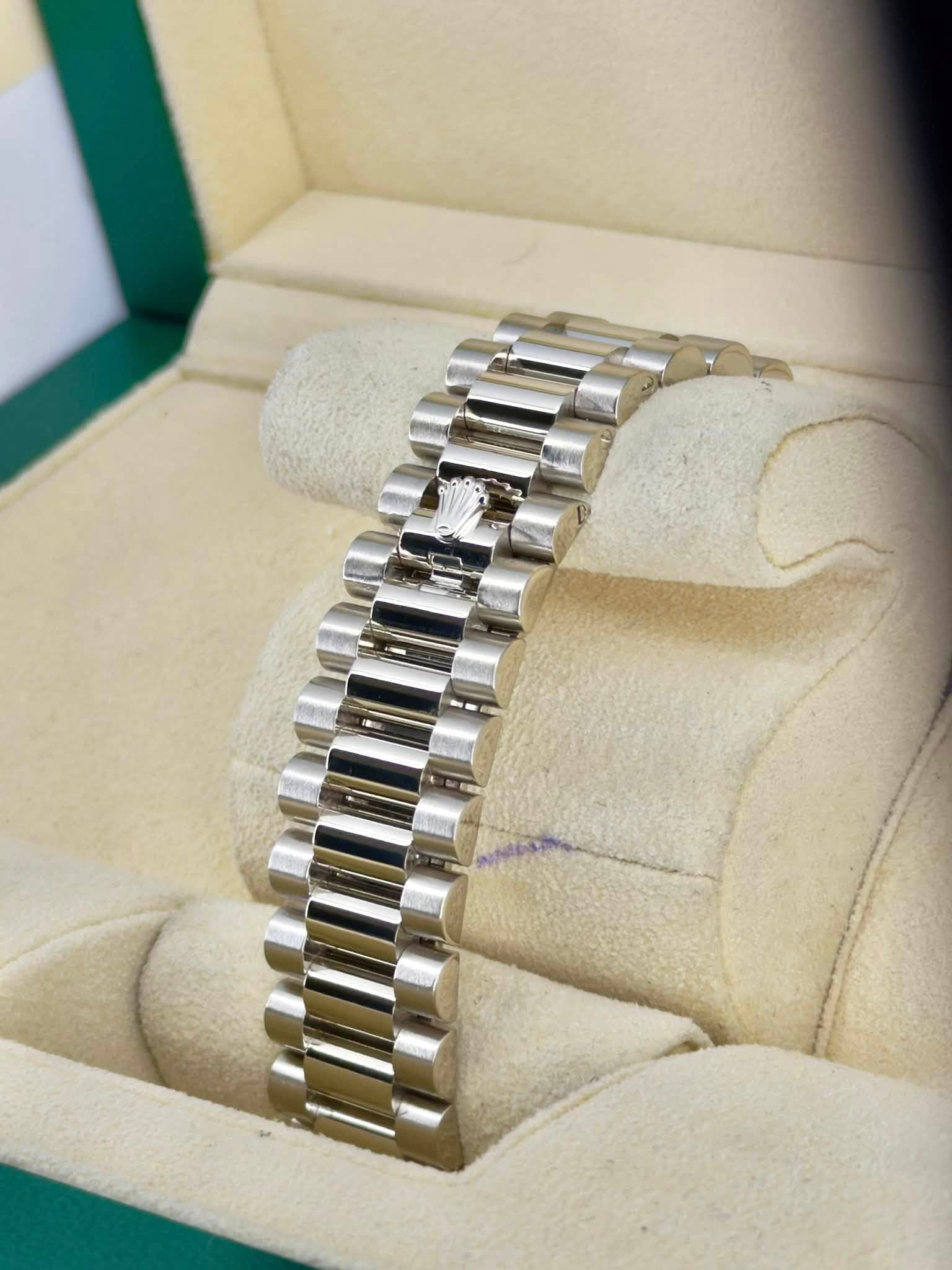 May be an image of wrist watch and jewelry