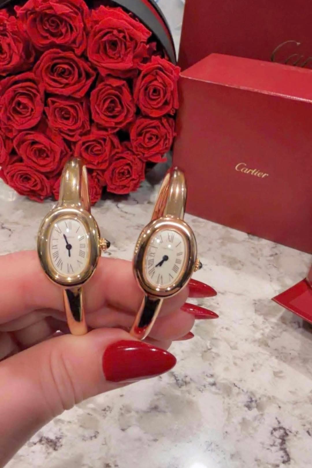 May be an image of wrist watch and text