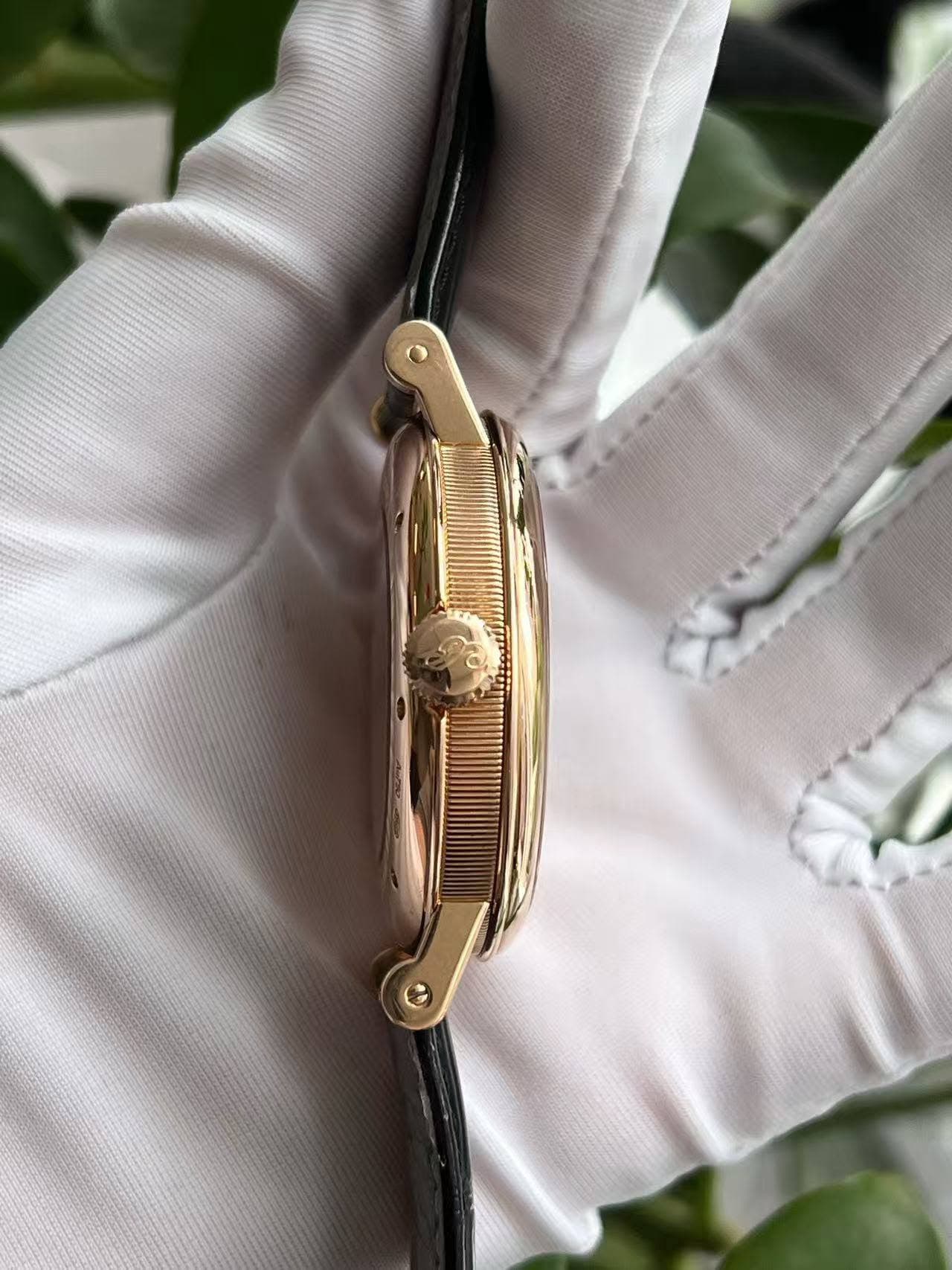 May be an image of wrist watch