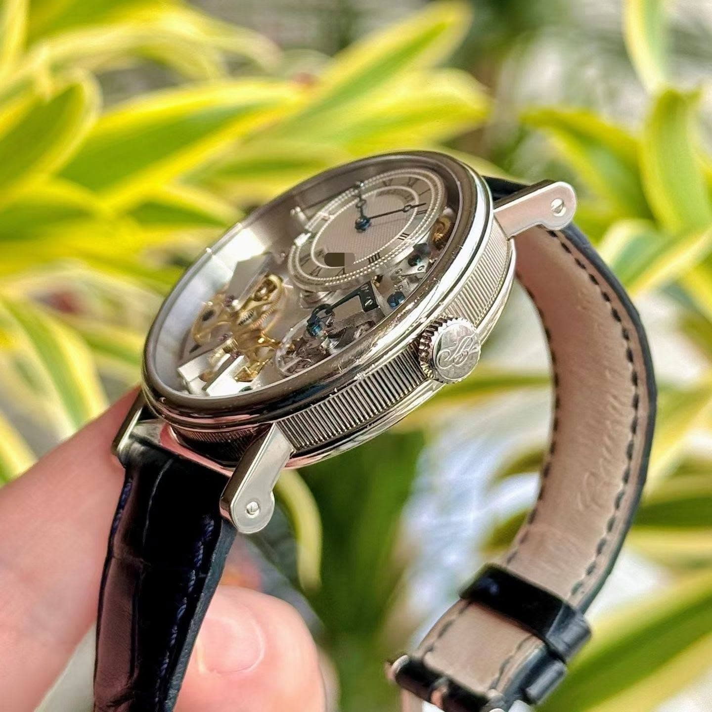 May be an image of wrist watch