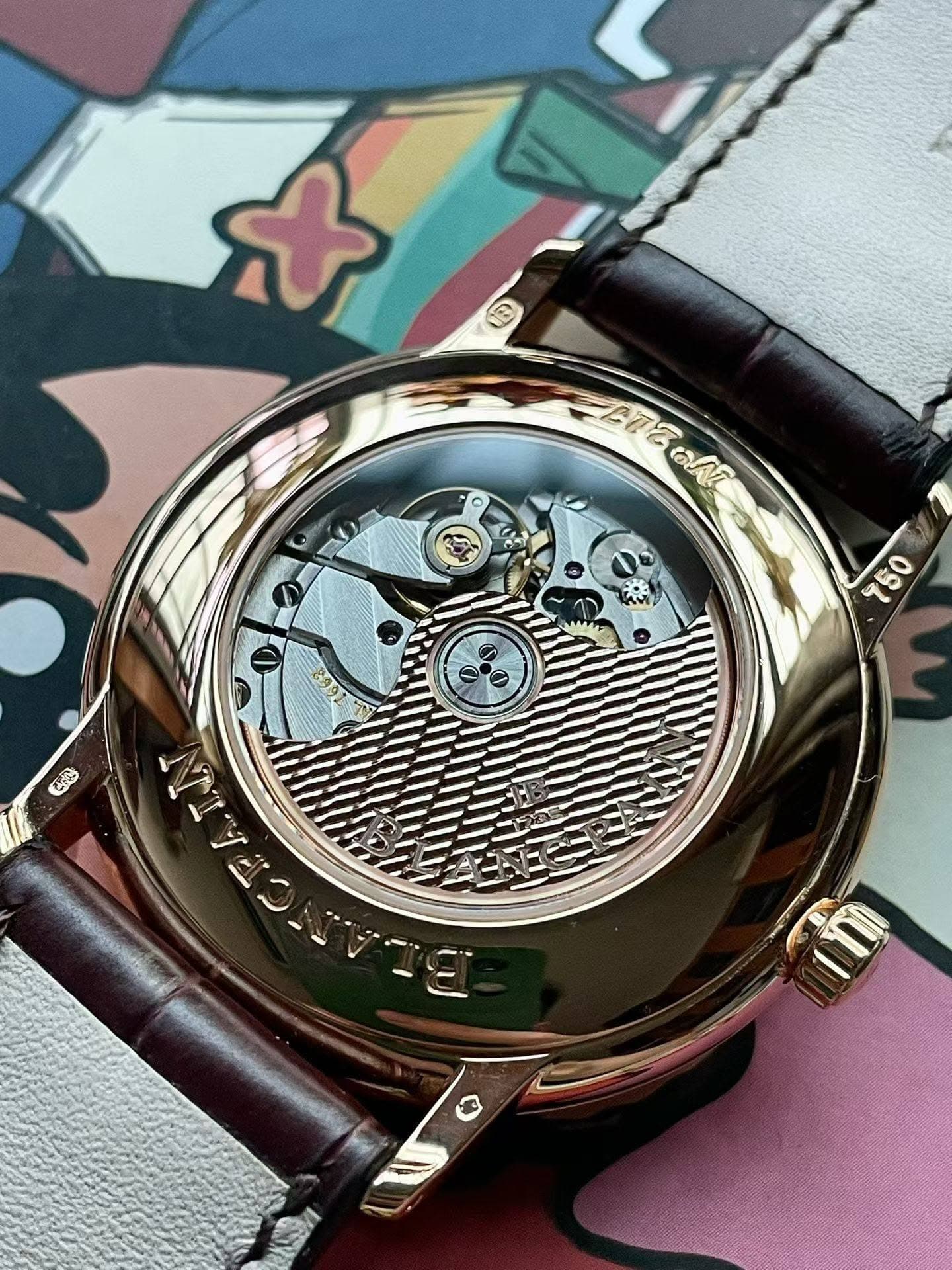 May be an image of wrist watch and text