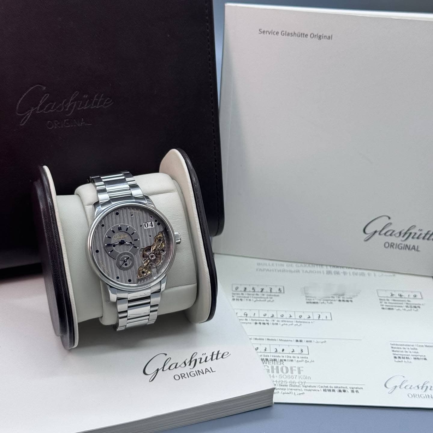 May be an image of wrist watch and text