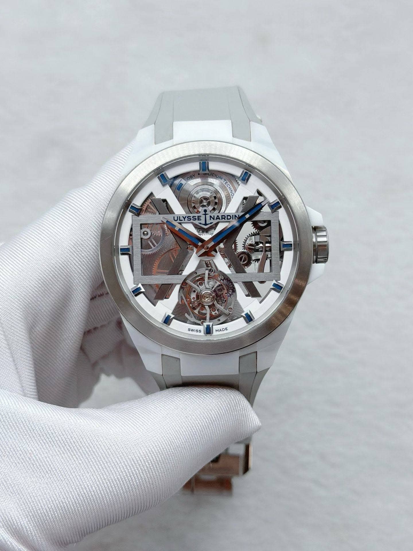 May be an image of wrist watch and text