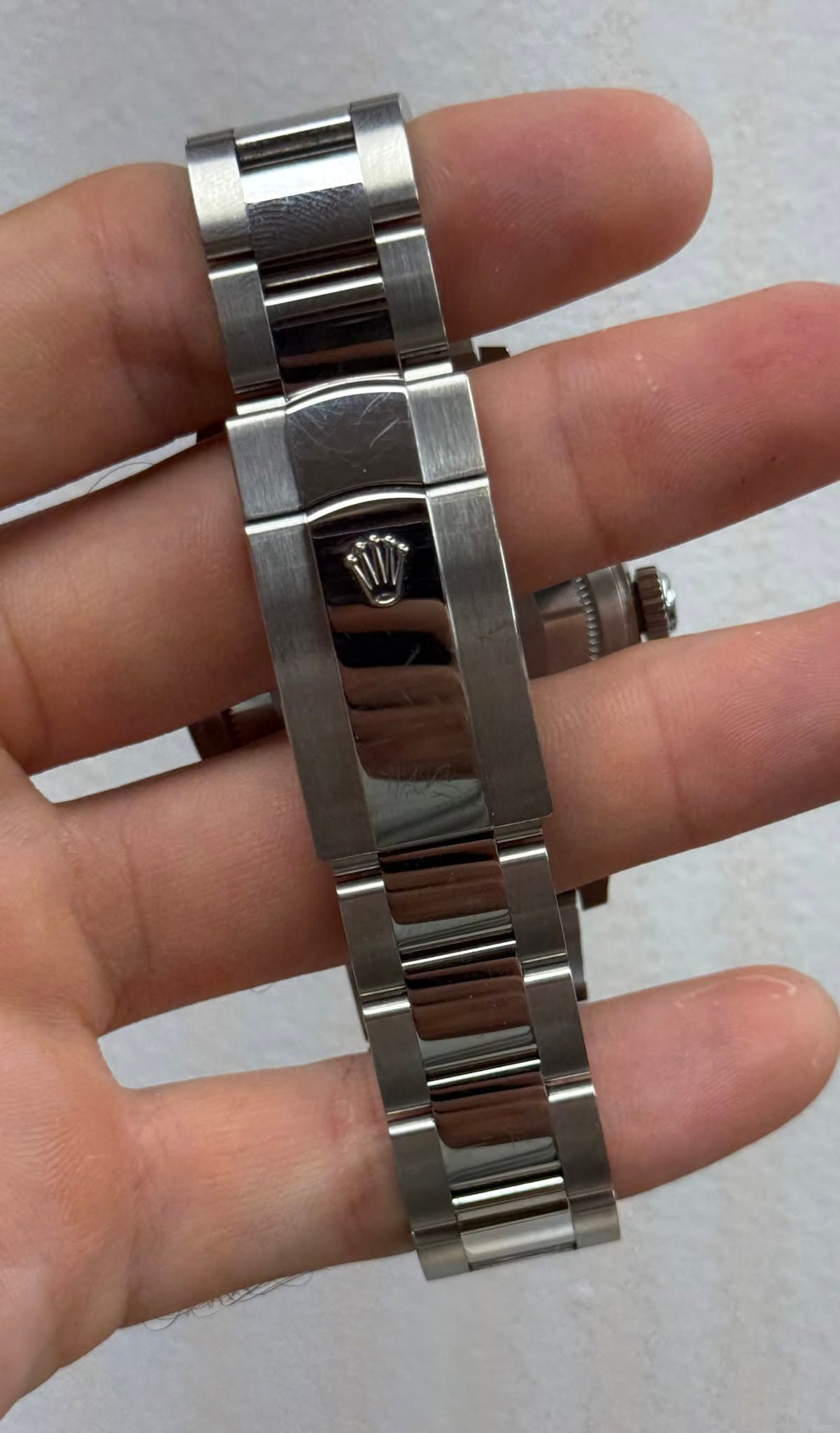May be an image of wrist watch