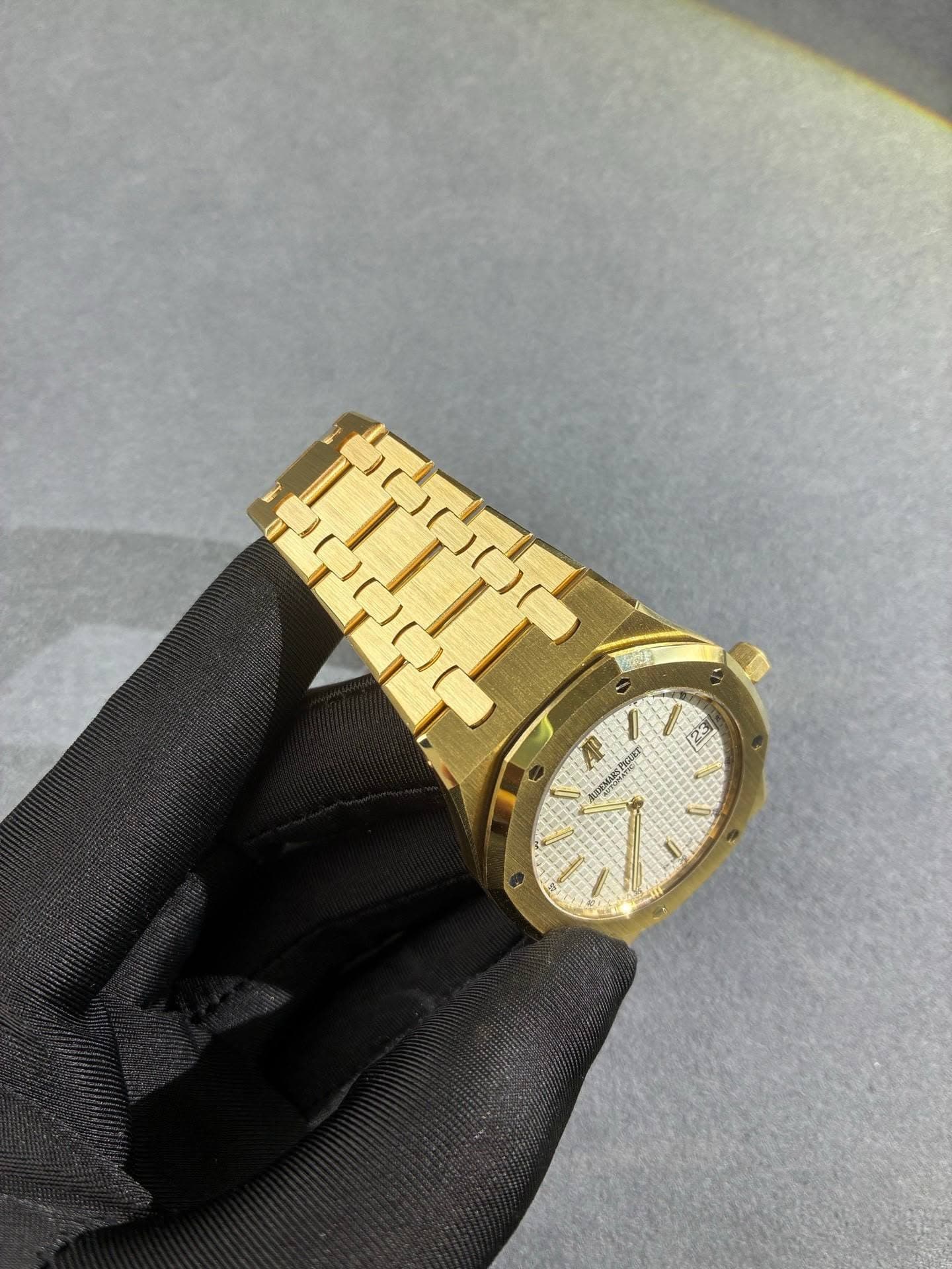 May be an image of wrist watch and text