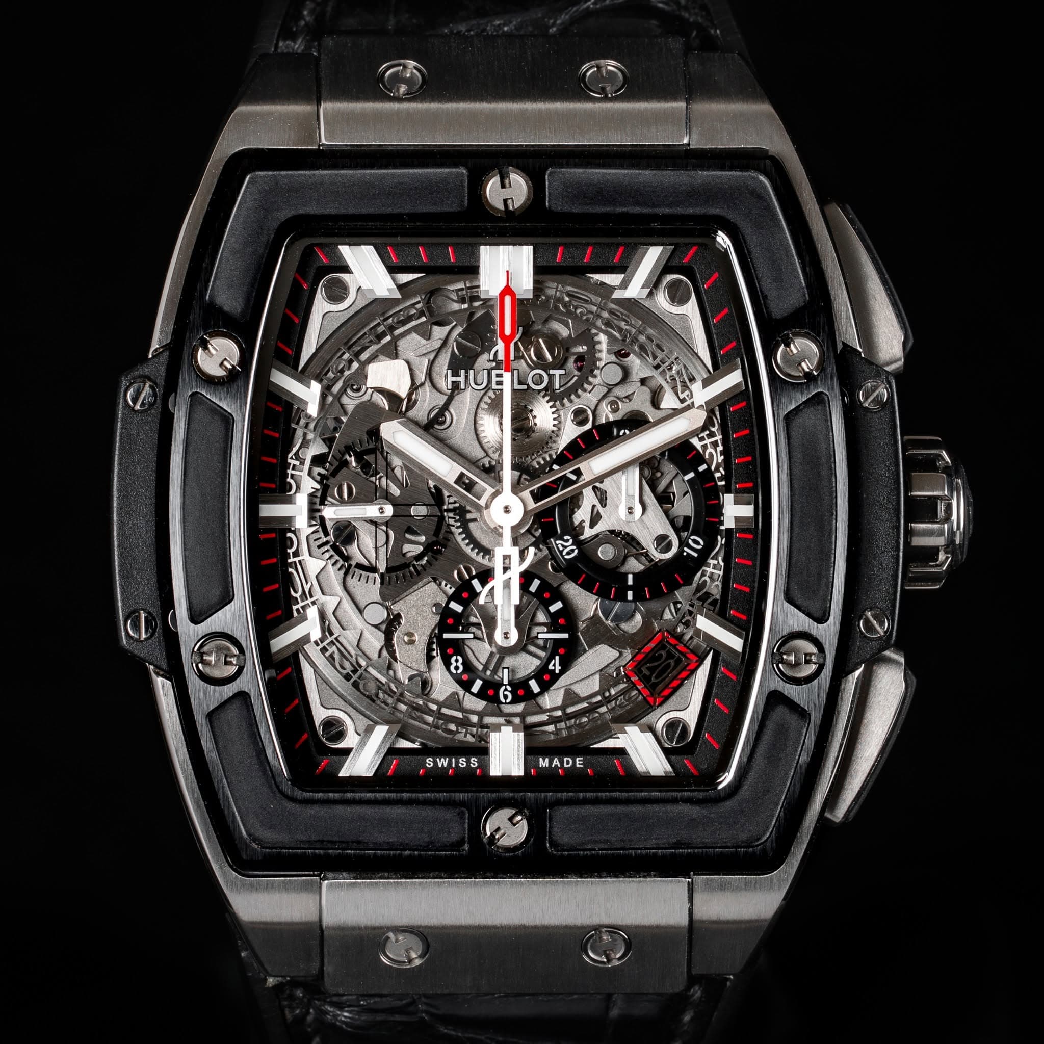 May be an image of wrist watch and text that says '٢ mi HUBLOT OT ف A 10 8 ア SWISS MADE'