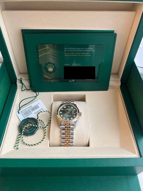 May be an image of wrist watch and text that says 'eo tante MODEL278273 M278273- 8150D372 OYSTERM @ a f 3'